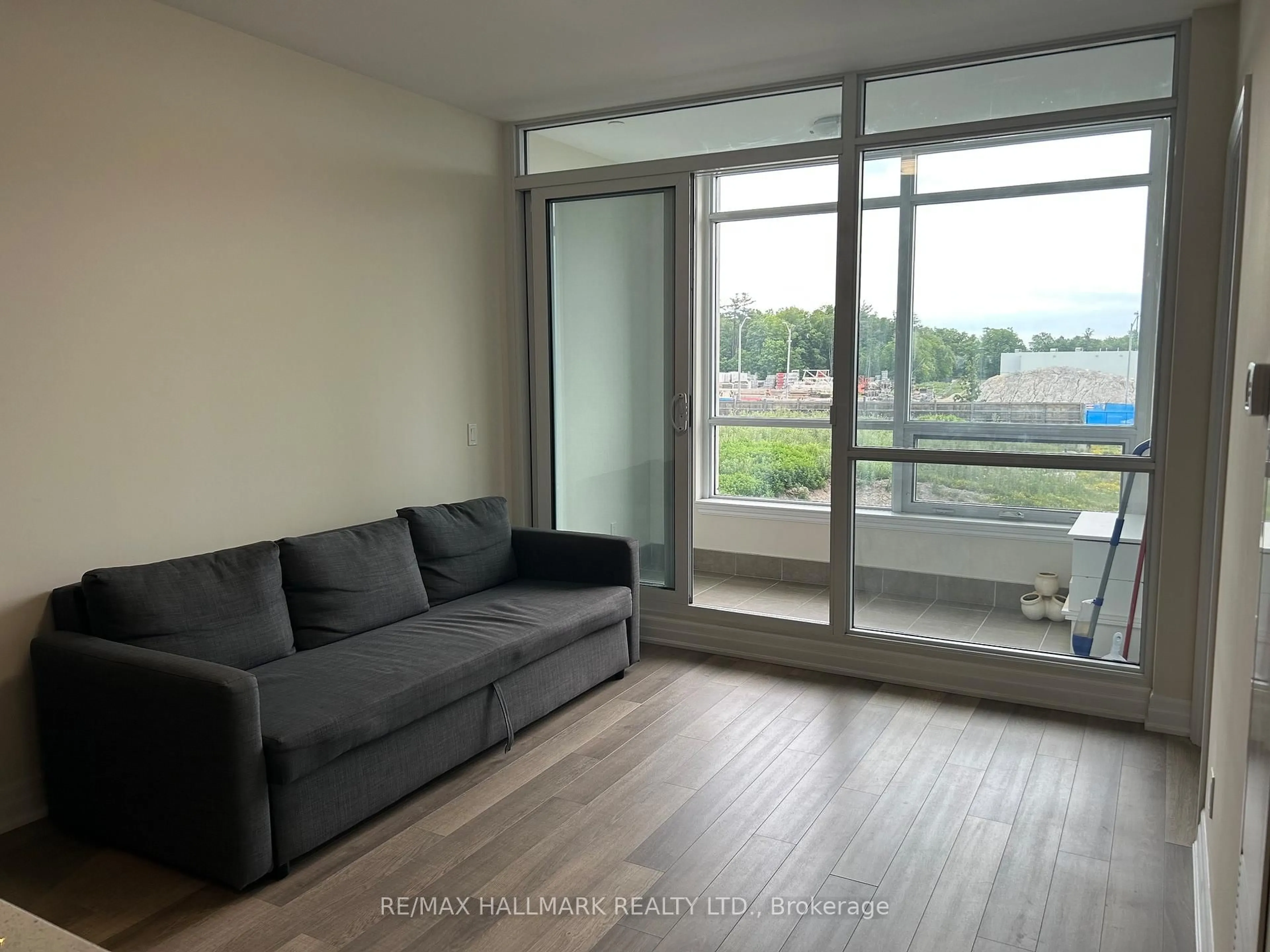 Living room with furniture, unknown for 9085 Jane St #219, Vaughan Ontario L4K 0L8