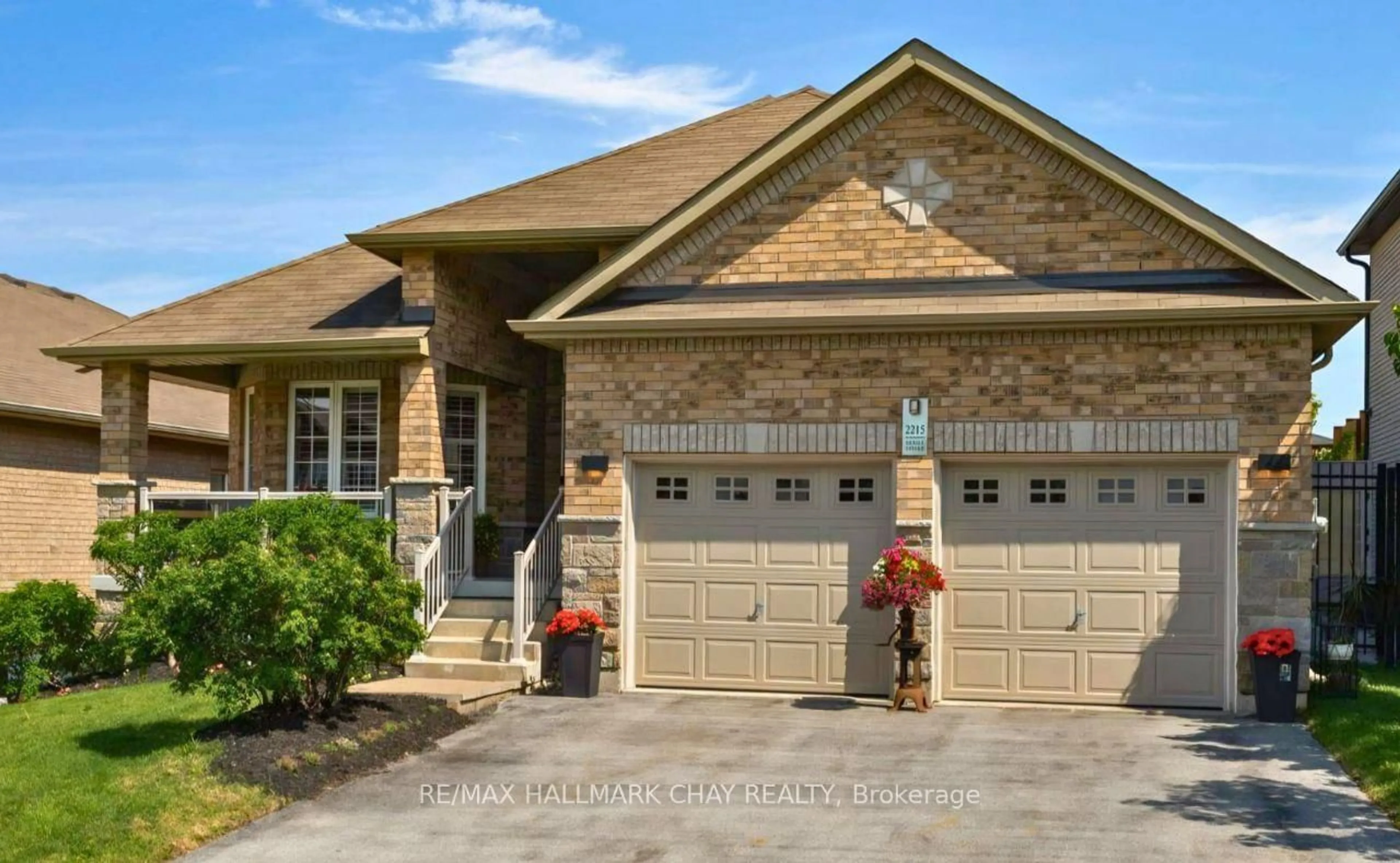 Home with brick exterior material, street for 2215 Nevils St, Innisfil Ontario L9S 0E2