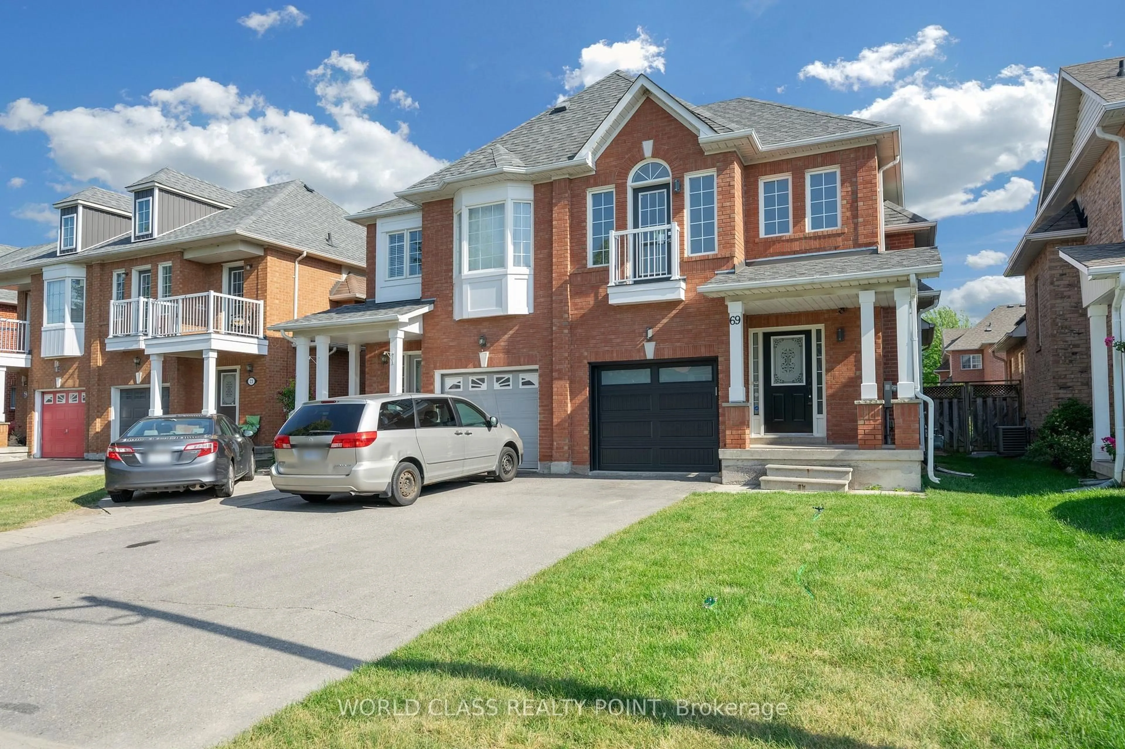 Home with brick exterior material, street for 69 Redkey Dr, Markham Ontario L3S 4R4