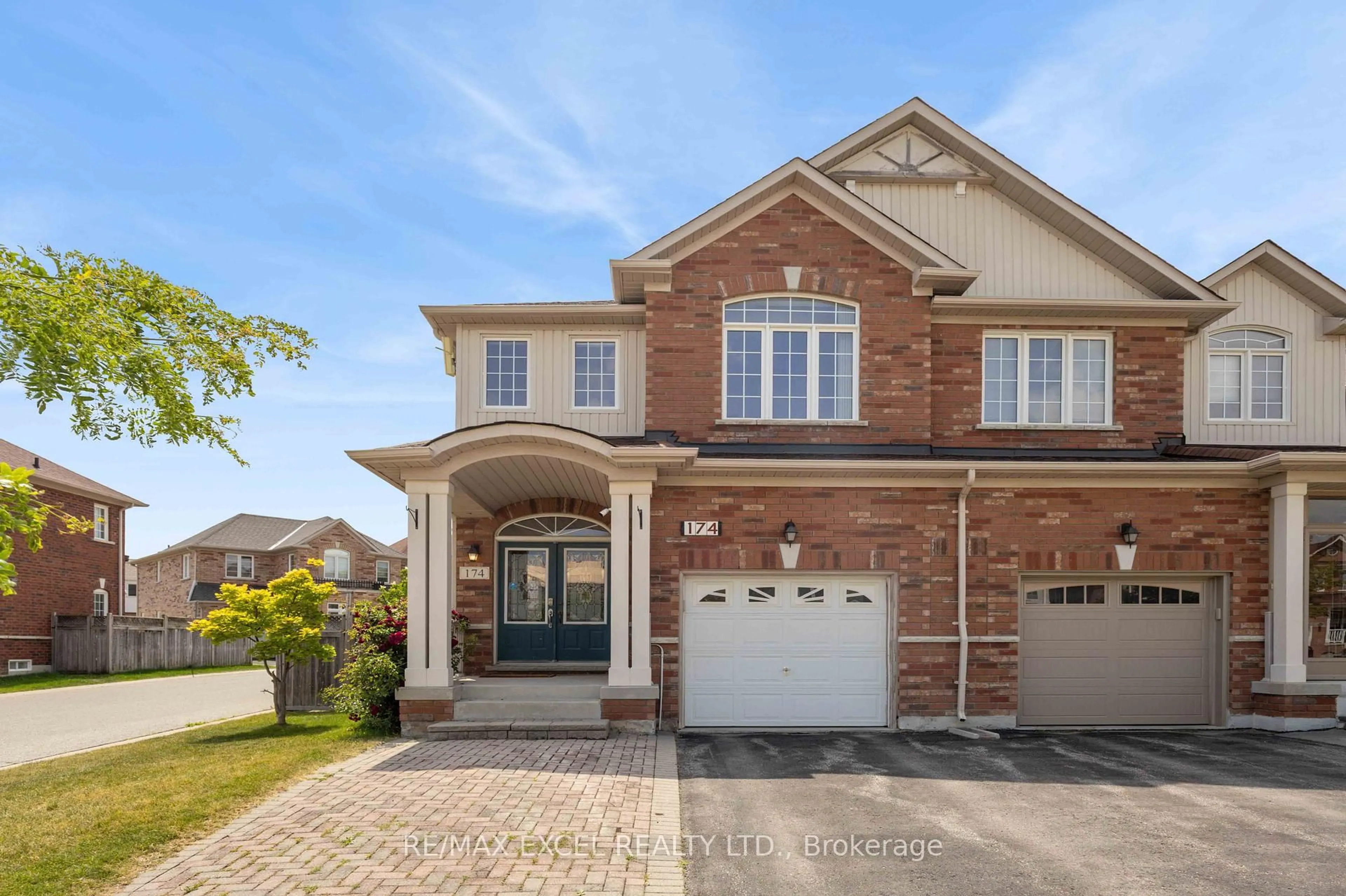 Home with brick exterior material, street for 174 Roy Rainey Ave, Markham Ontario L6E 1G6