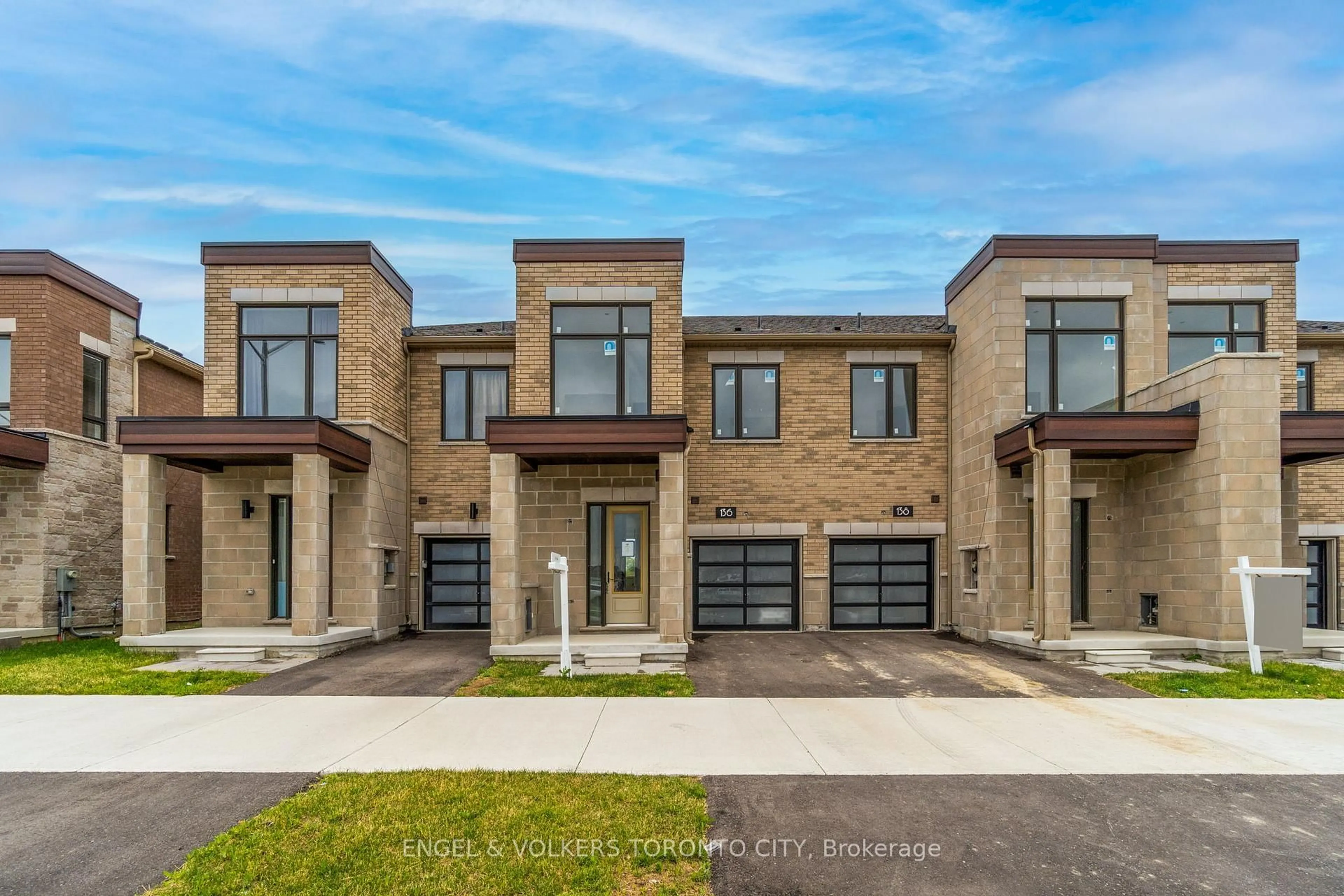 Home with brick exterior material, street for 136 Mumbai Dr, Markham Ontario L3S 0G5