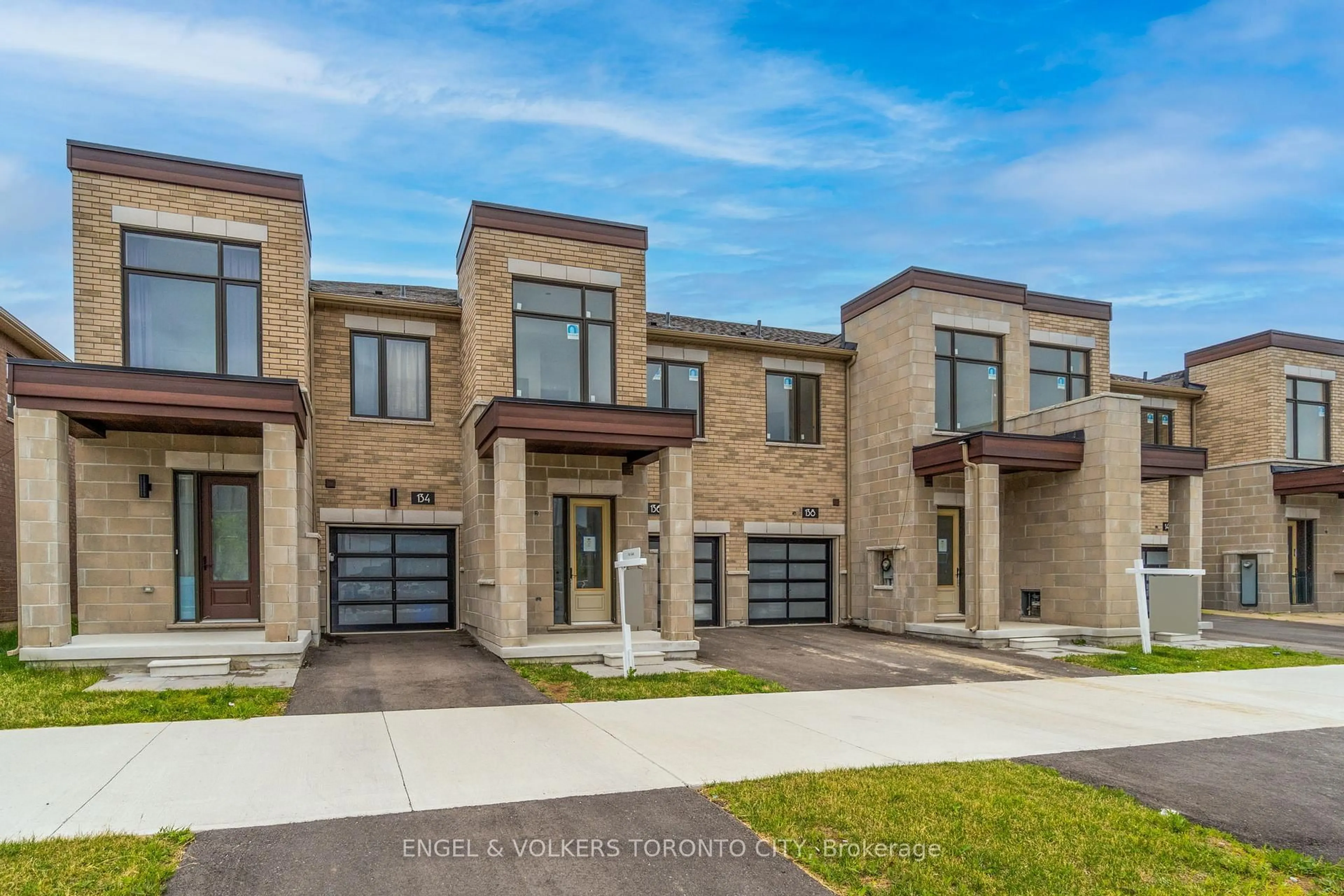Home with brick exterior material, street for 136 Mumbai Dr, Markham Ontario L3S 0G5