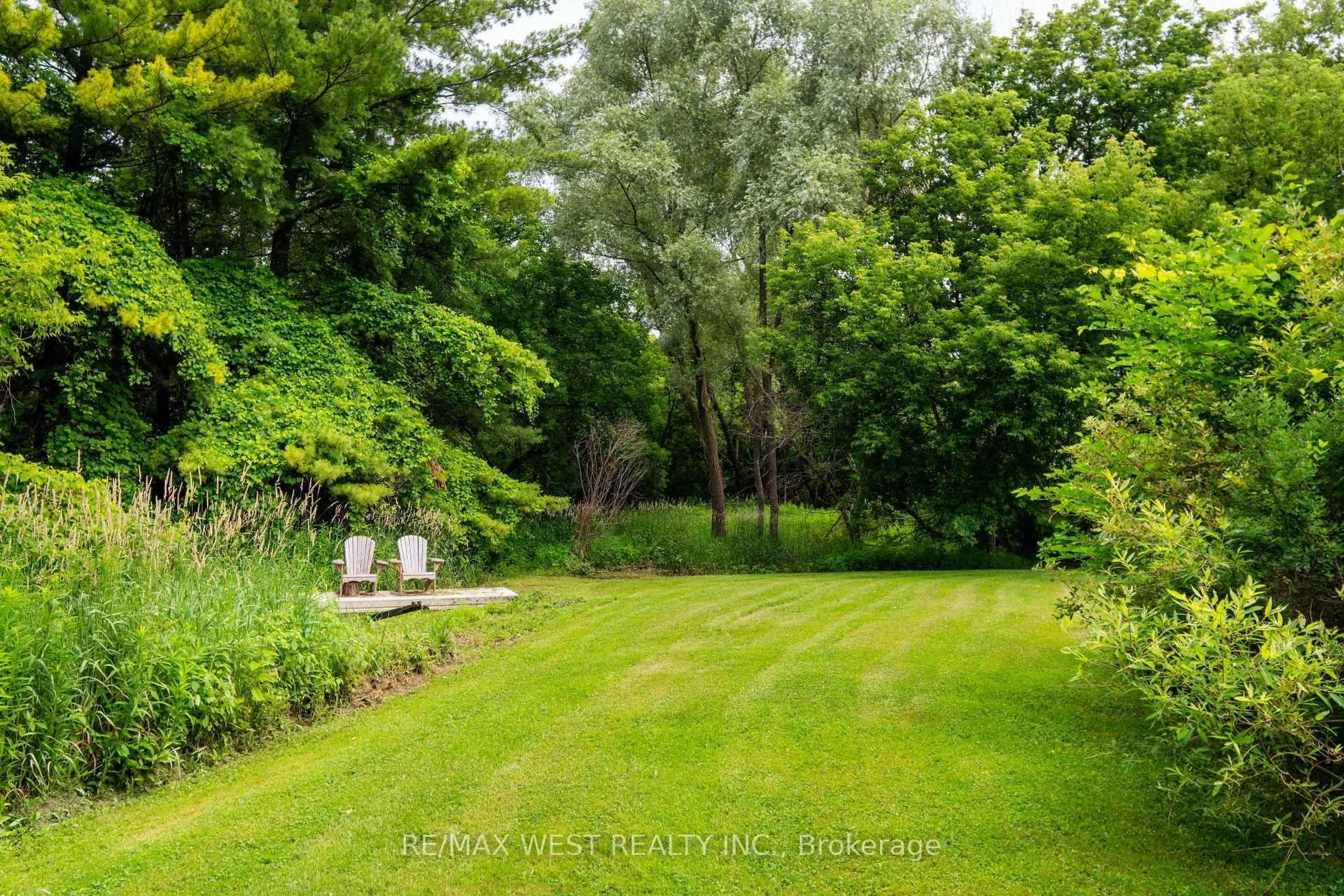 A pic from outside/outdoor area/front of a property/back of a property/a pic from drone, forest/trees view for 7324 Highway 9 Rd, New Tecumseth Ontario L0G 1T0