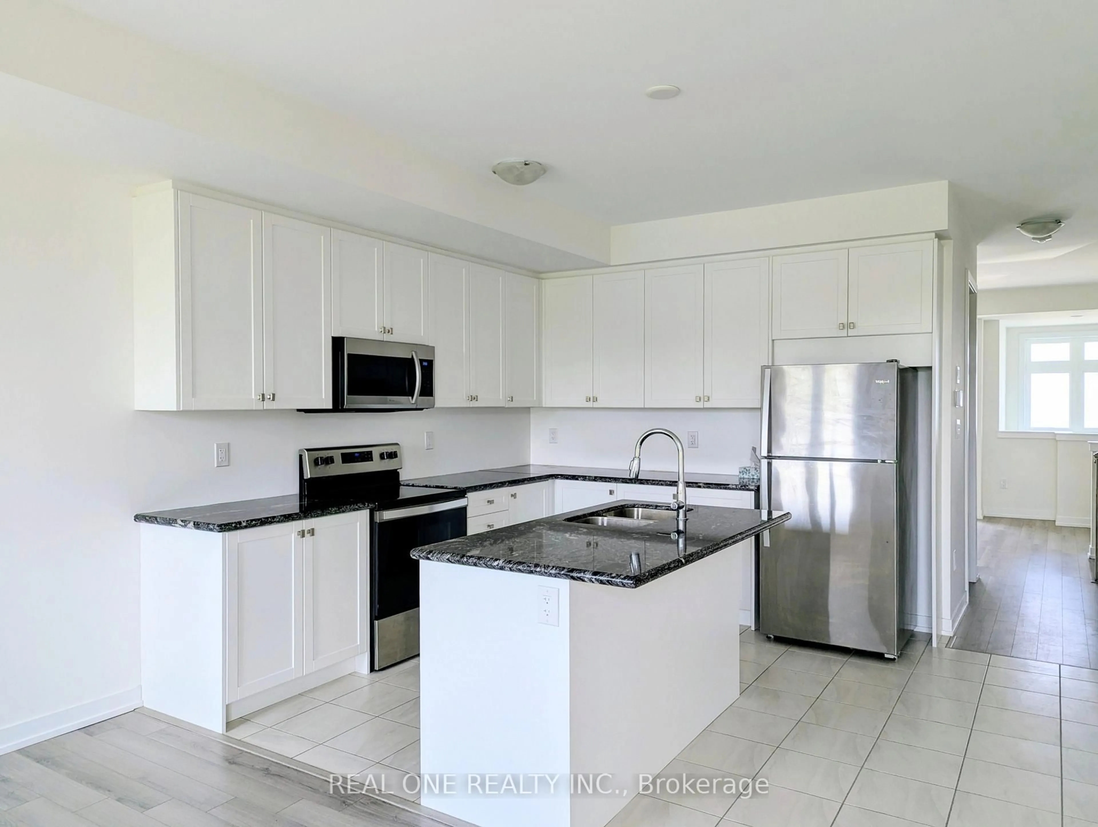 Open concept kitchen, ceramic/tile floor for 85 Riley Reed Lane, Richmond Hill Ontario L4S 0M3