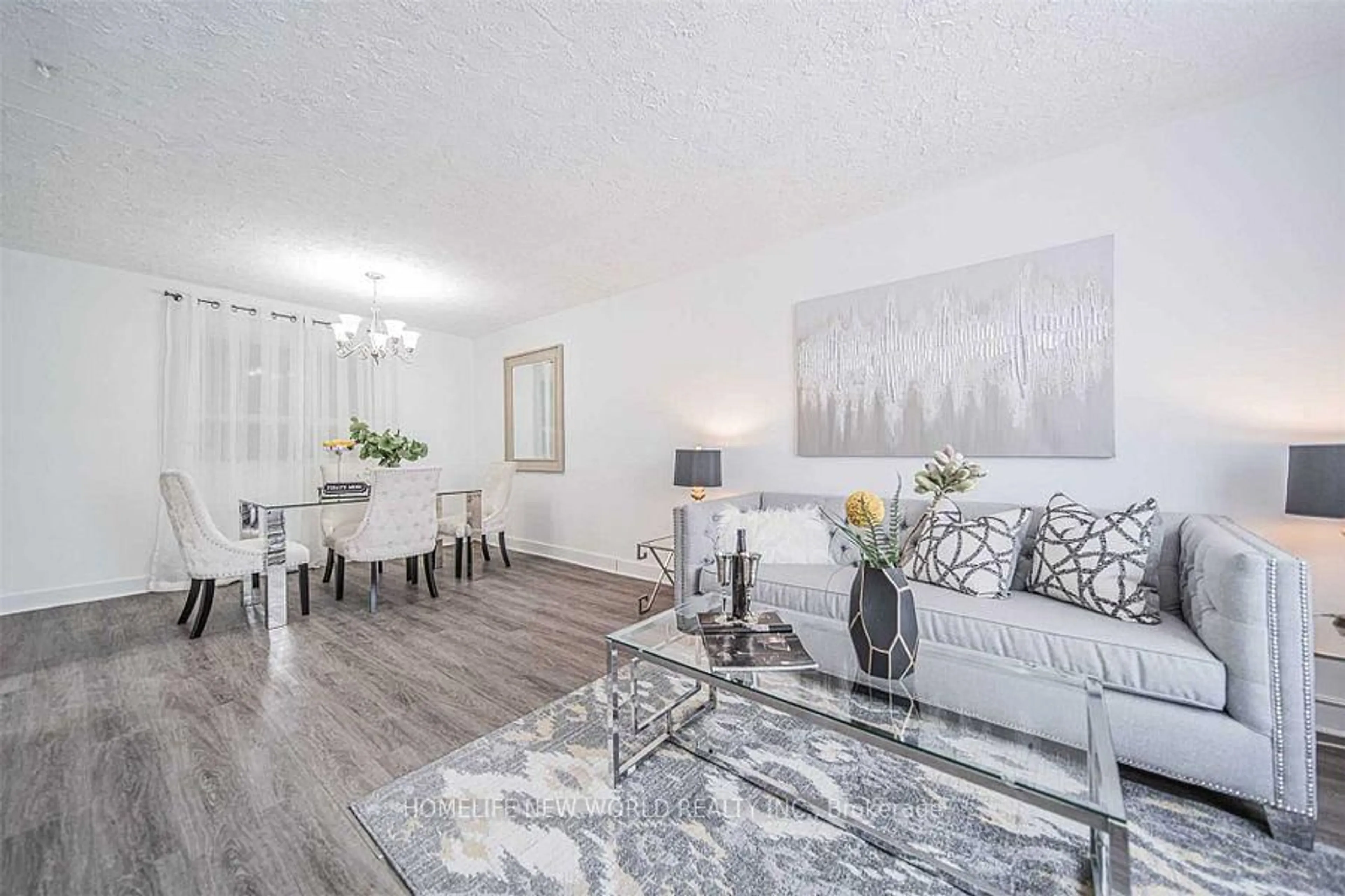 Living room with furniture, wood/laminate floor for 235 Axminster Dr, Richmond Hill Ontario L4C 2W2