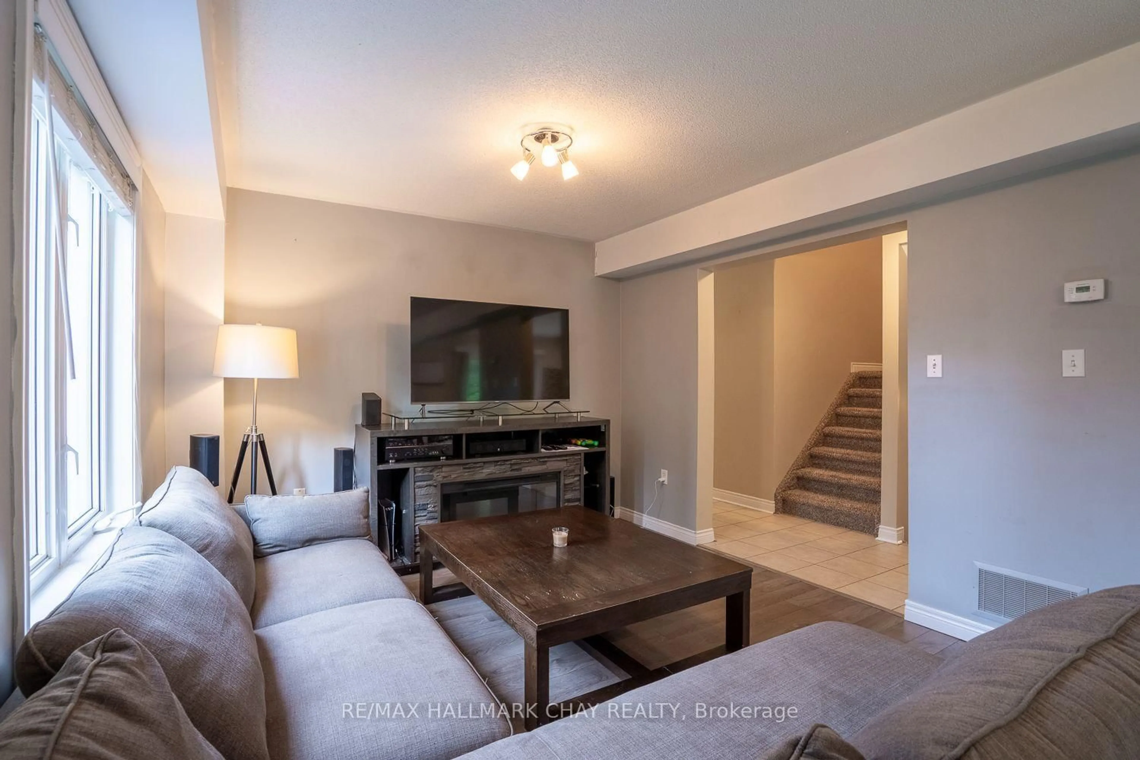 Living room with furniture, unknown for 23 Burbank Circ, Adjala-Tosorontio Ontario L0M 1J0
