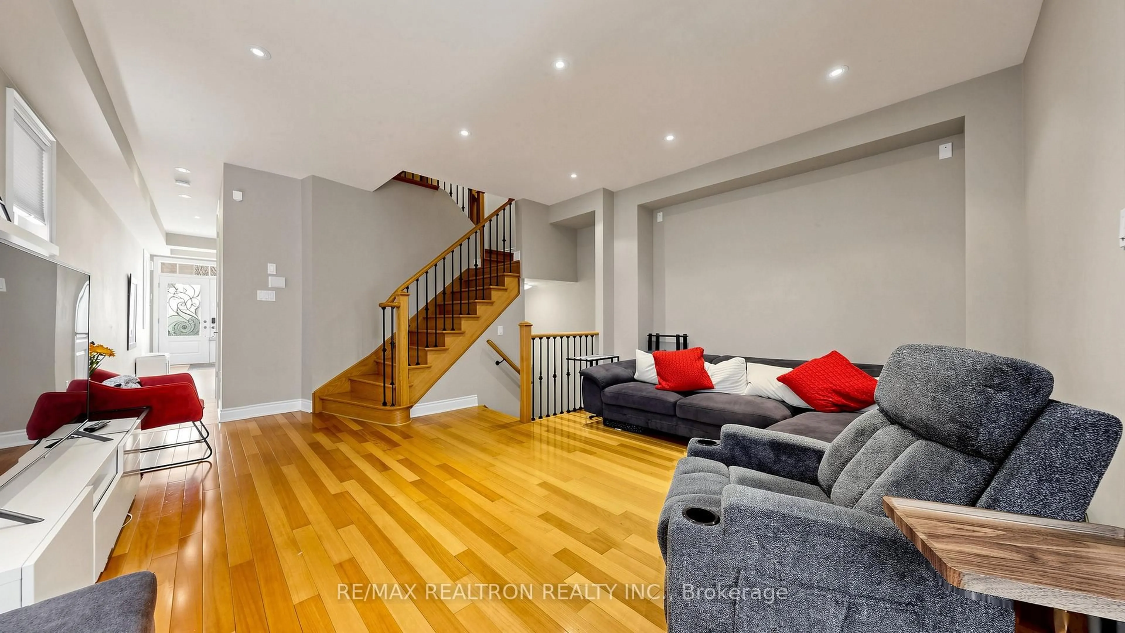 Living room with furniture, wood/laminate floor for 55 Bristlewood Cres, Vaughan Ontario L4J 9K9