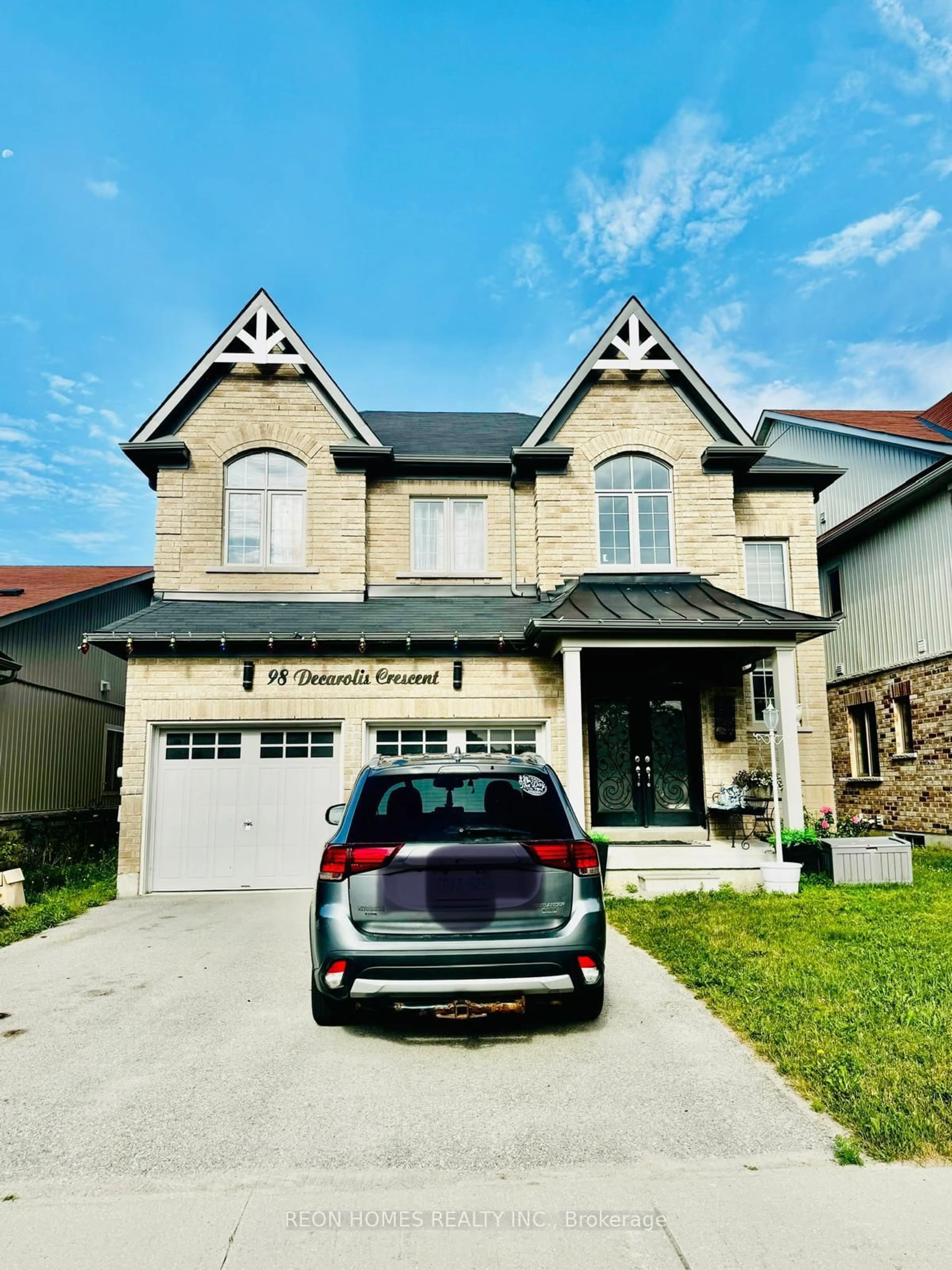 Home with brick exterior material, street for 98 Decarolis Cres, Essa Ontario L0M 1B4