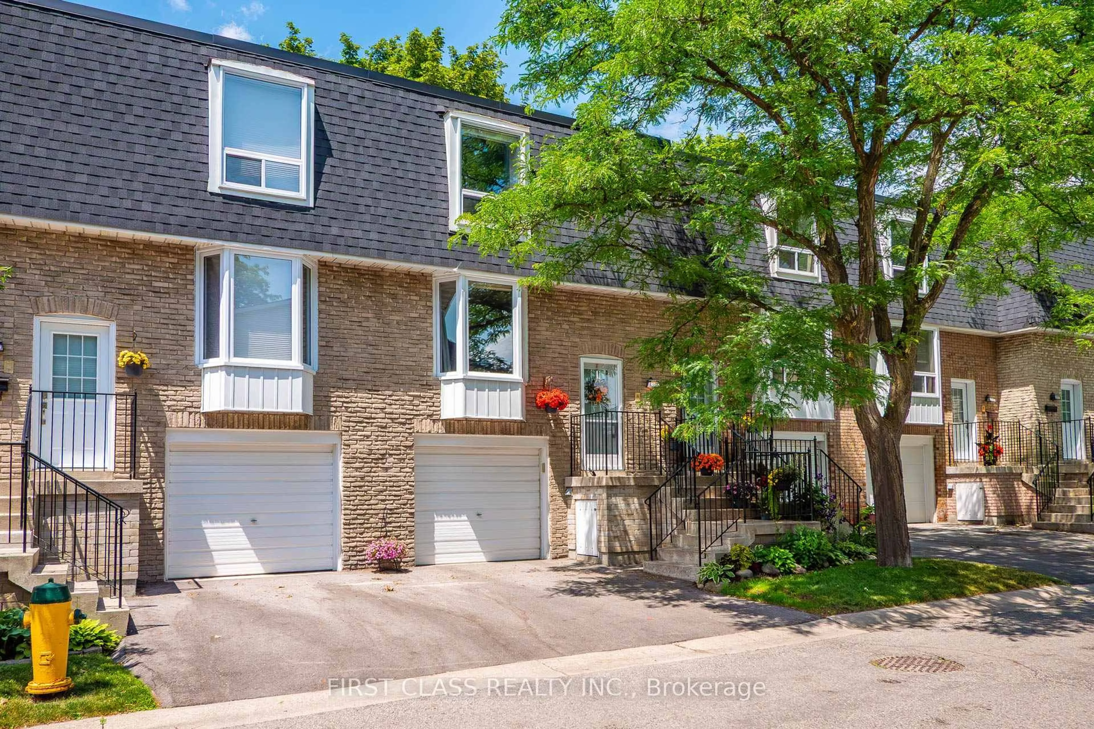 Home with brick exterior material, street for 202 Royal Orchard Blvd, Markham Ontario L3T 3E7