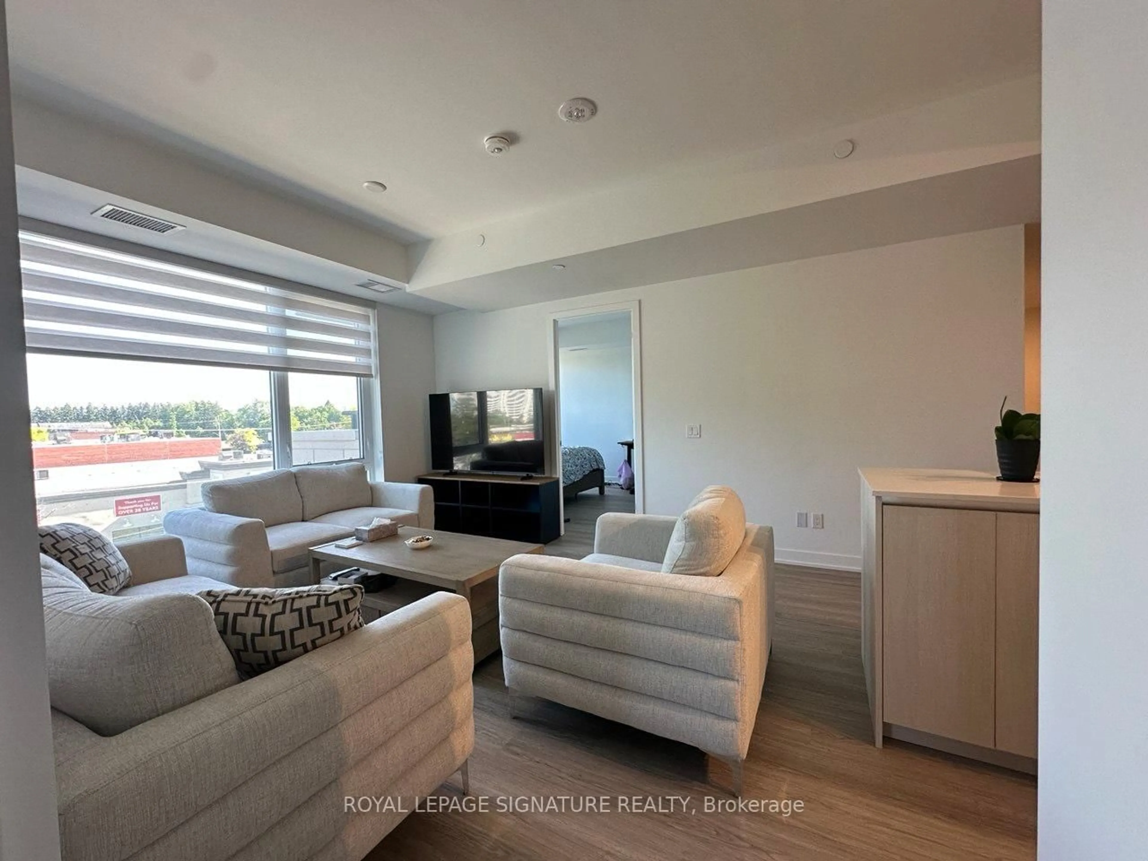 Living room with furniture, unknown for 8188 Yonge St #222, Vaughan Ontario L4J 0M2