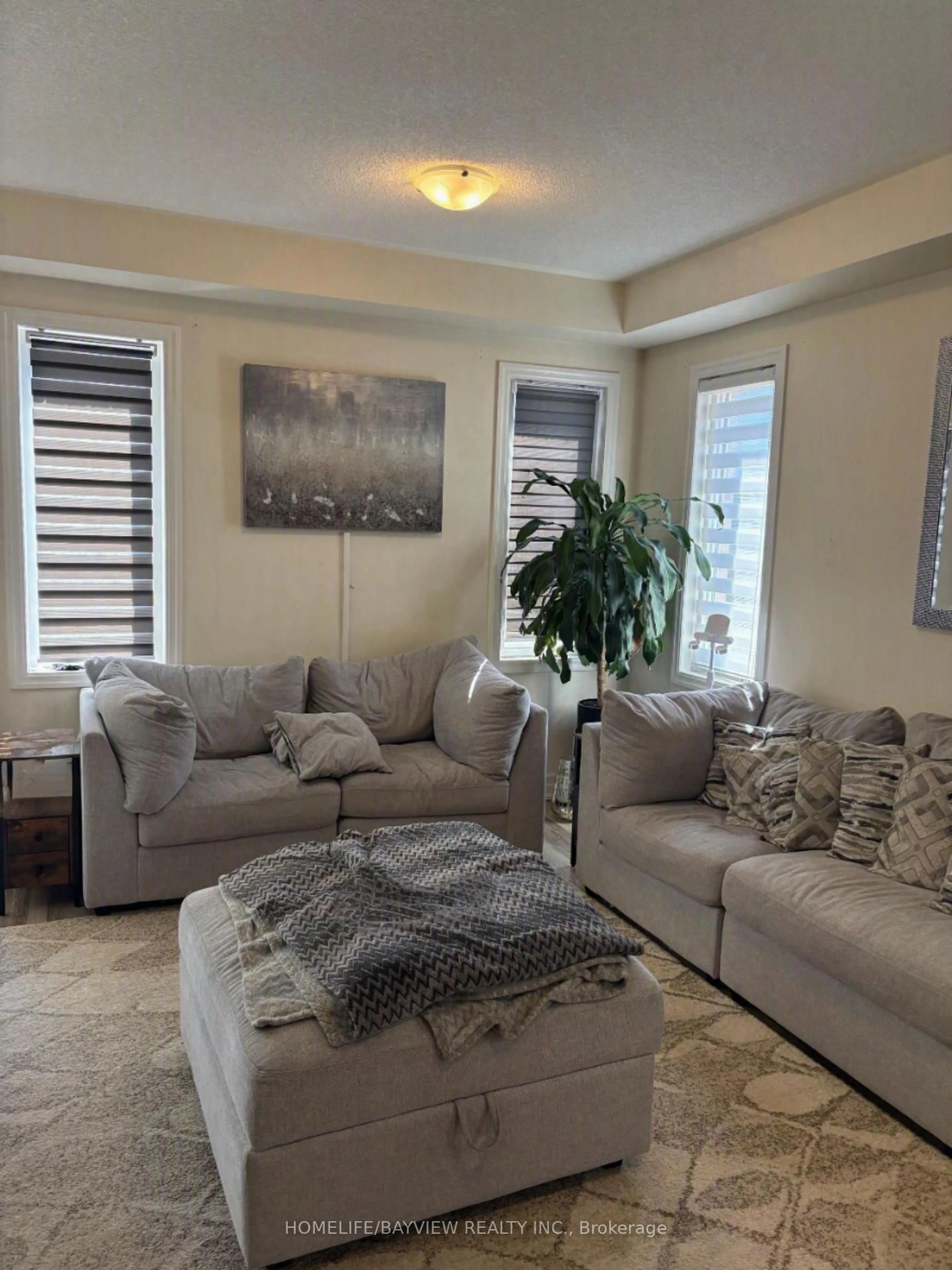 Living room with furniture, unknown for 43 Hutton Cres, Essa Ontario L0M 1B6