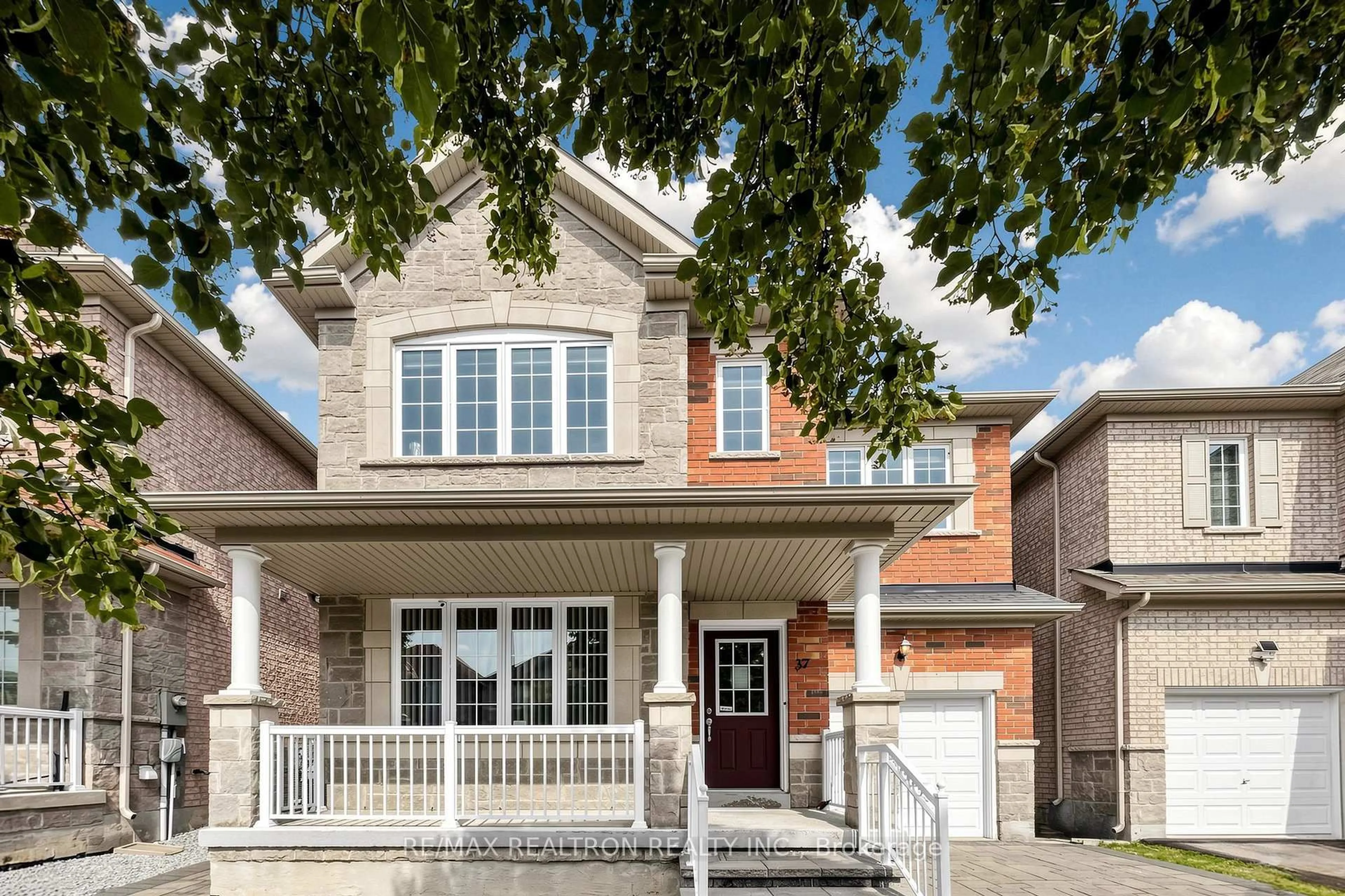 Home with brick exterior material, street for 37 Greenspire Ave, Markham Ontario L6E 0N2