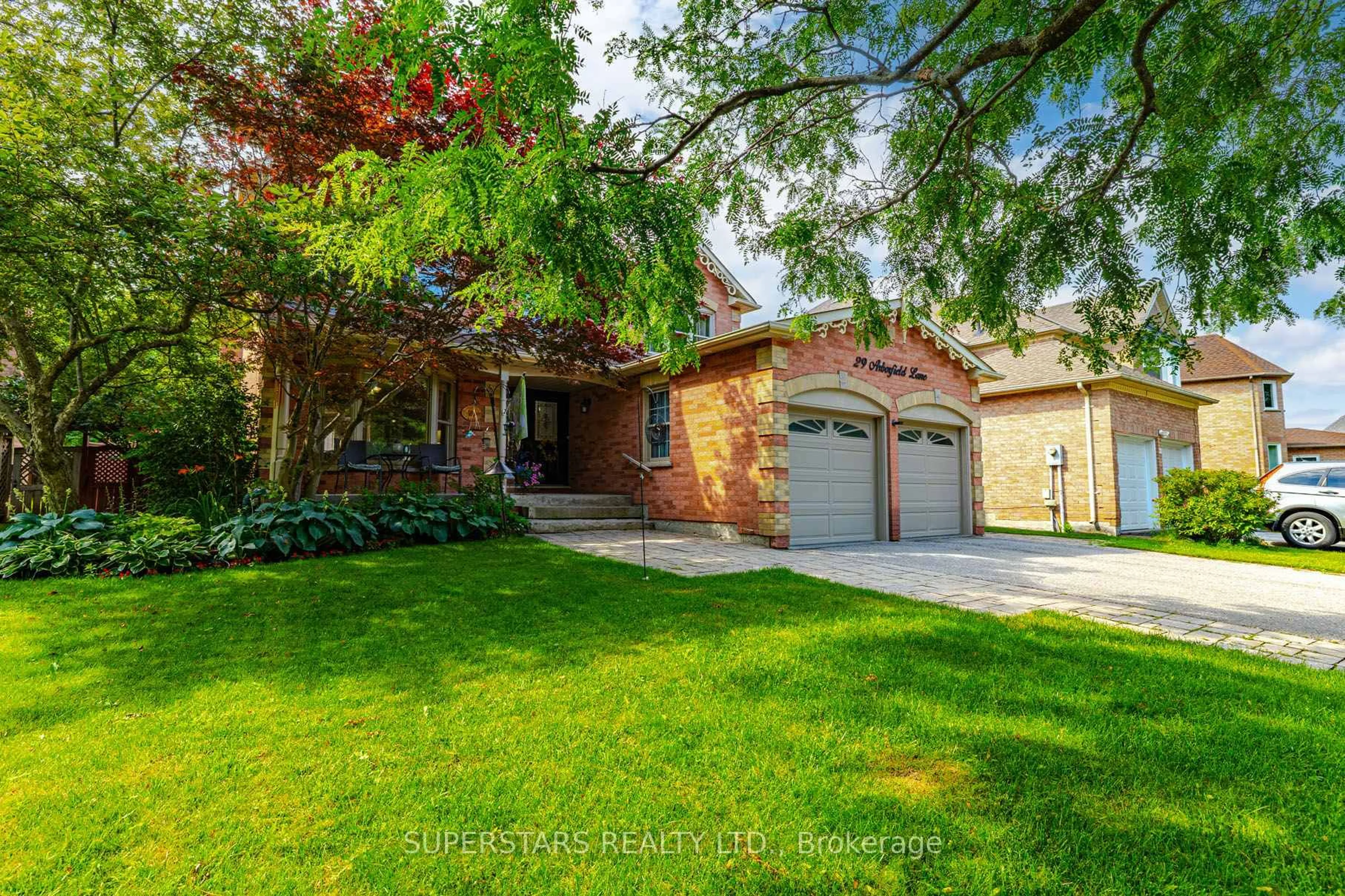 Home with brick exterior material, street for 29 Arborfield Lane, Markham Ontario L3P 7R7