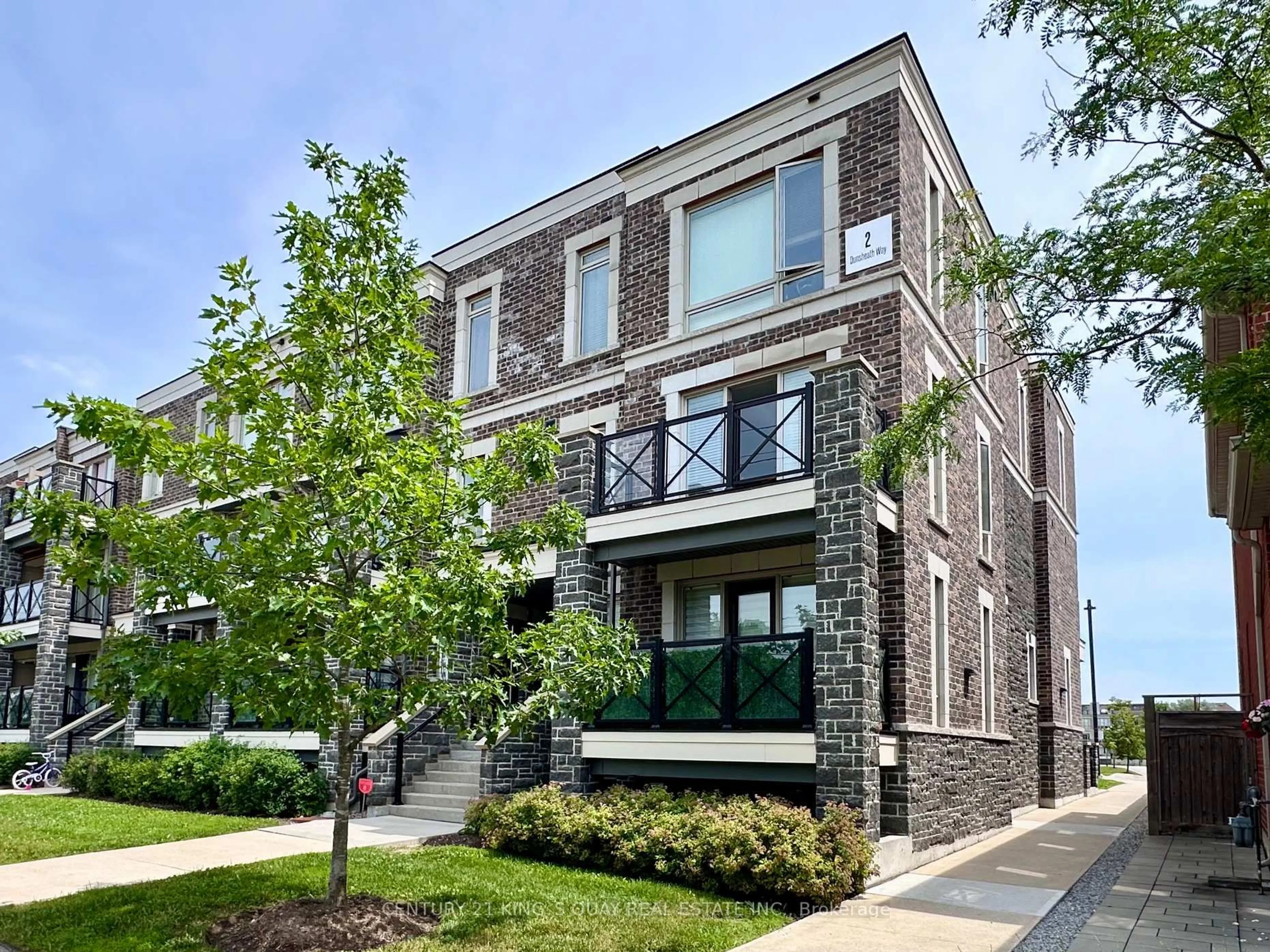 Home with brick exterior material, street for 2 Dunsheath Way #102, Markham Ontario L6B 1N3