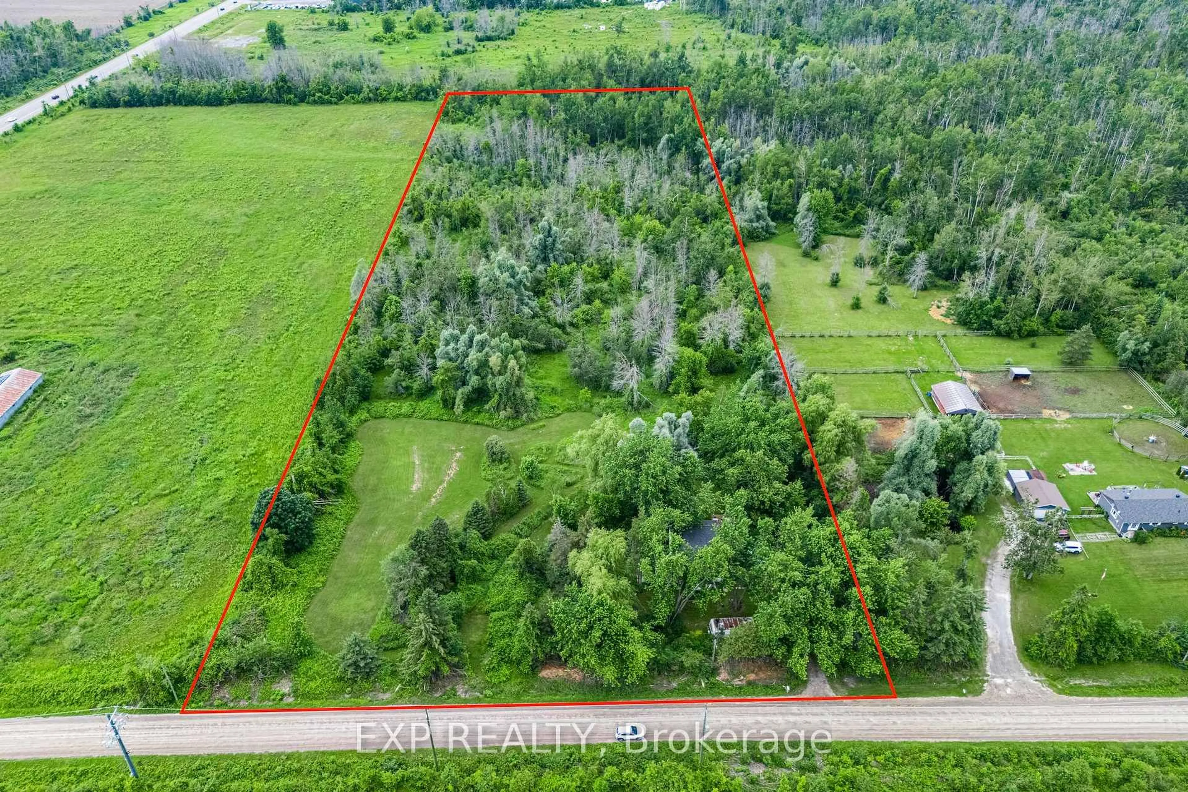 A pic from outside/outdoor area/front of a property/back of a property/a pic from drone, forest/trees view for 1435 Thorah Concession Road 7, Brock Ontario L0K 1A0