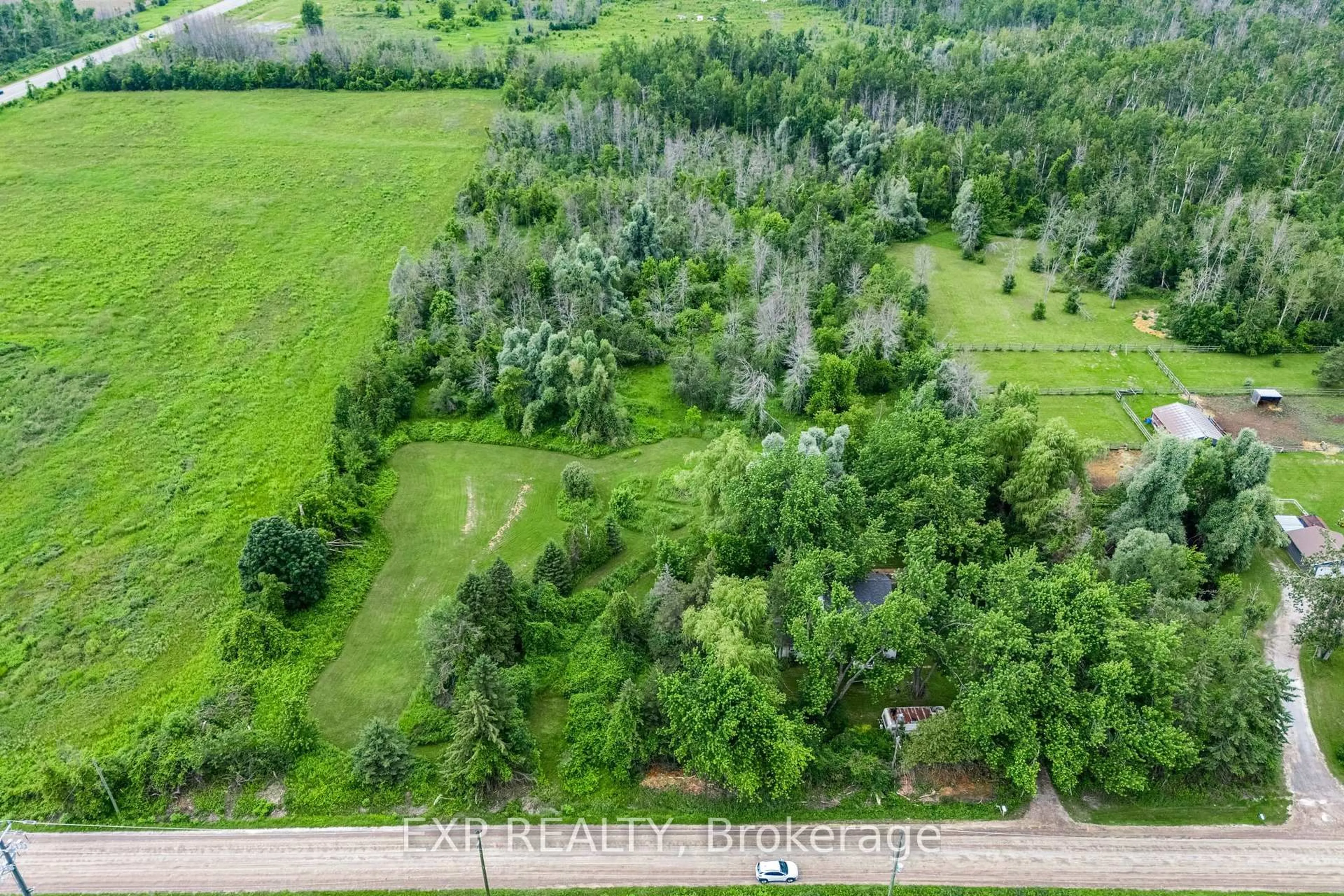 A pic from outside/outdoor area/front of a property/back of a property/a pic from drone, forest/trees view for 1435 Thorah Concession Road 7, Brock Ontario L0K 1A0