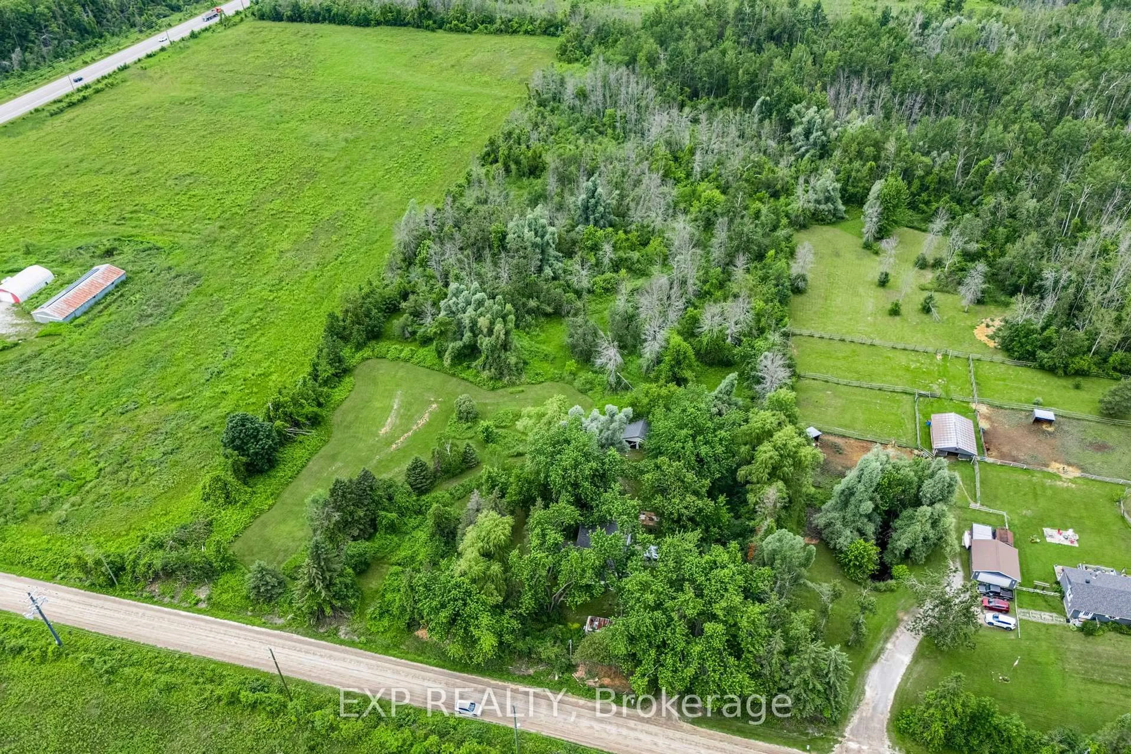 A pic from outside/outdoor area/front of a property/back of a property/a pic from drone, forest/trees view for 1435 Thorah Concession Road 7, Brock Ontario L0K 1A0