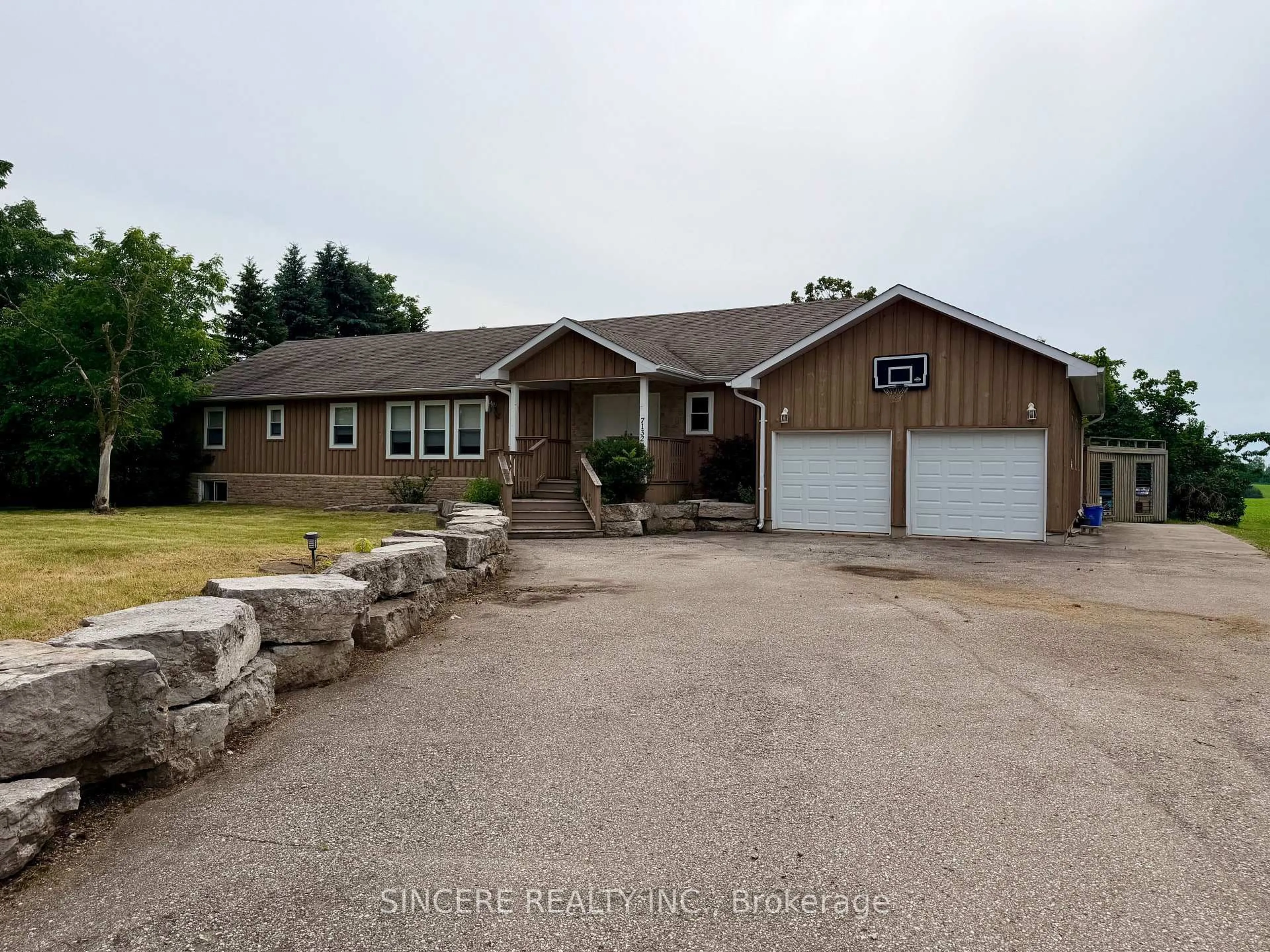 A pic from outside/outdoor area/front of a property/back of a property/a pic from drone, street for 7132 County Rd 27 Rd, Essa Ontario L0L 2N2