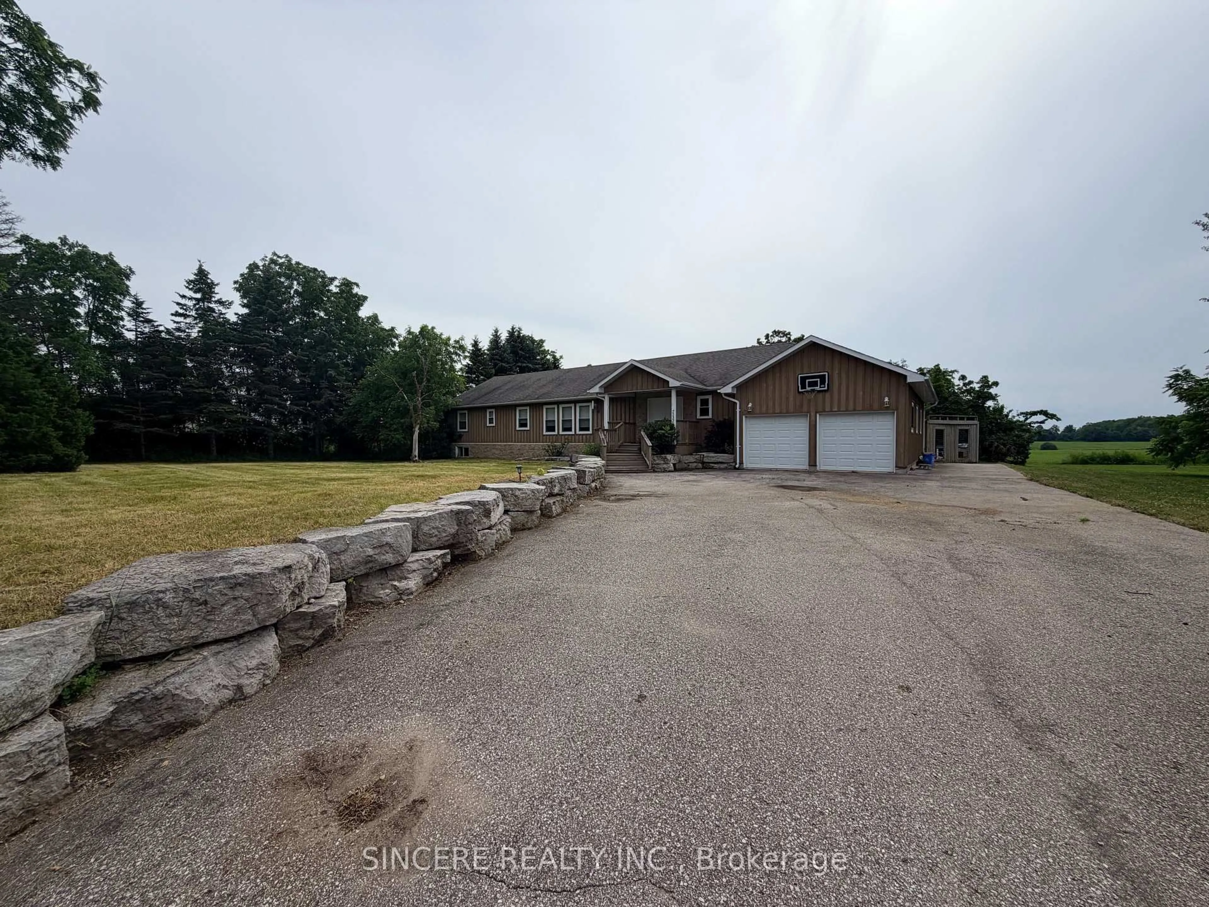 A pic from outside/outdoor area/front of a property/back of a property/a pic from drone, unknown for 7132 County Rd 27 Rd, Essa Ontario L0L 2N2