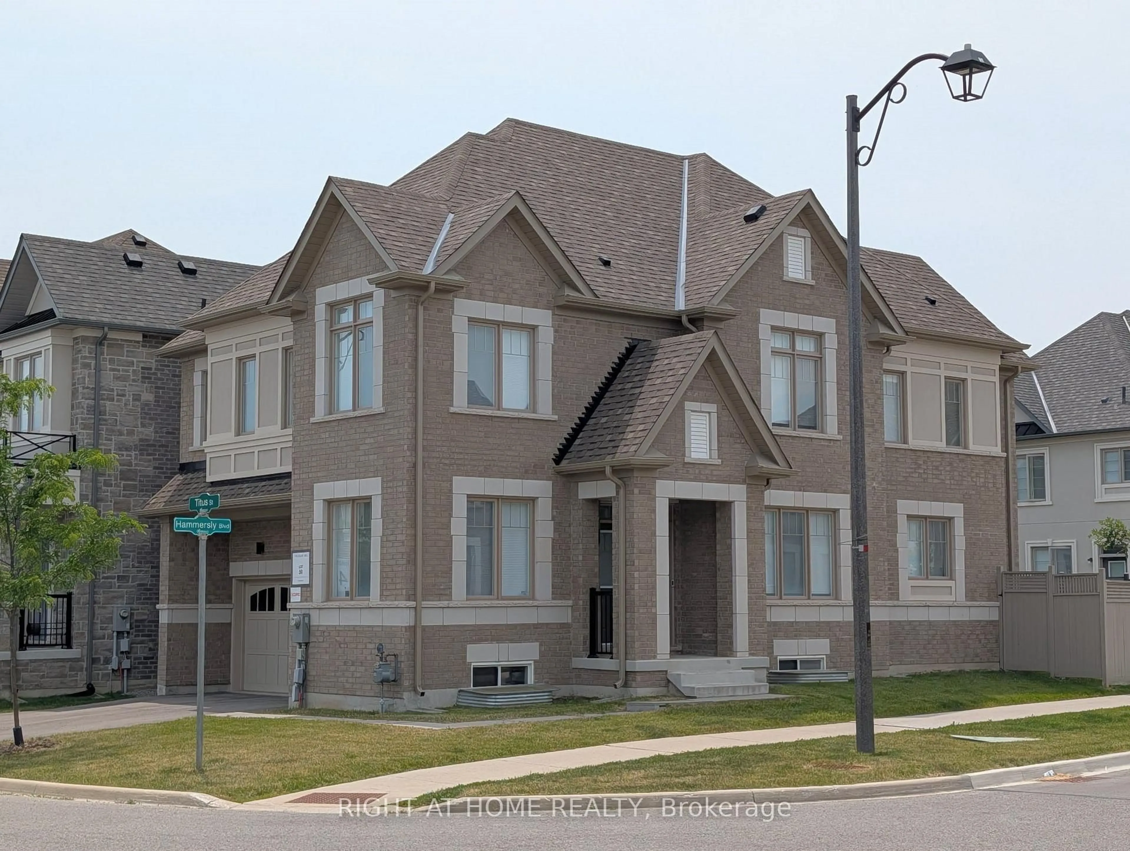 Home with brick exterior material, street for 62 Titus St, Markham Ontario L6E 0W1