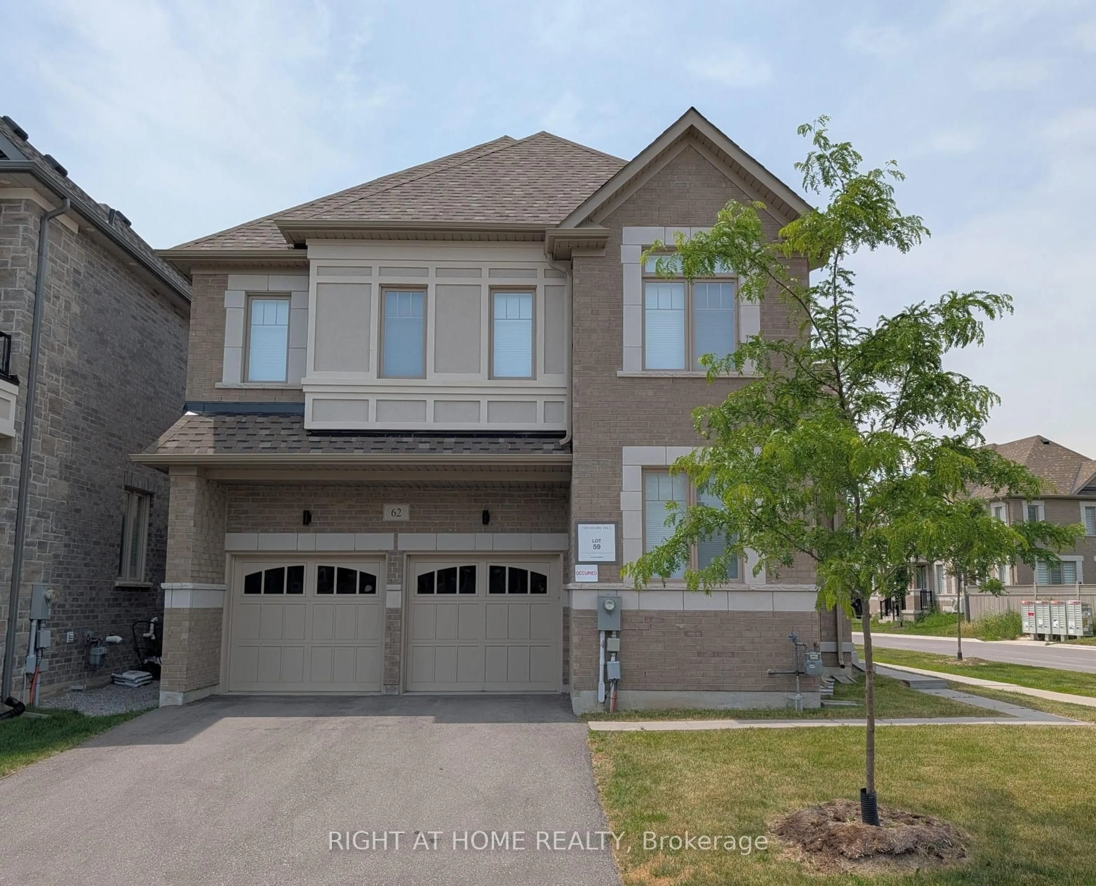 Home with brick exterior material, street for 62 Titus St, Markham Ontario L6E 0W1