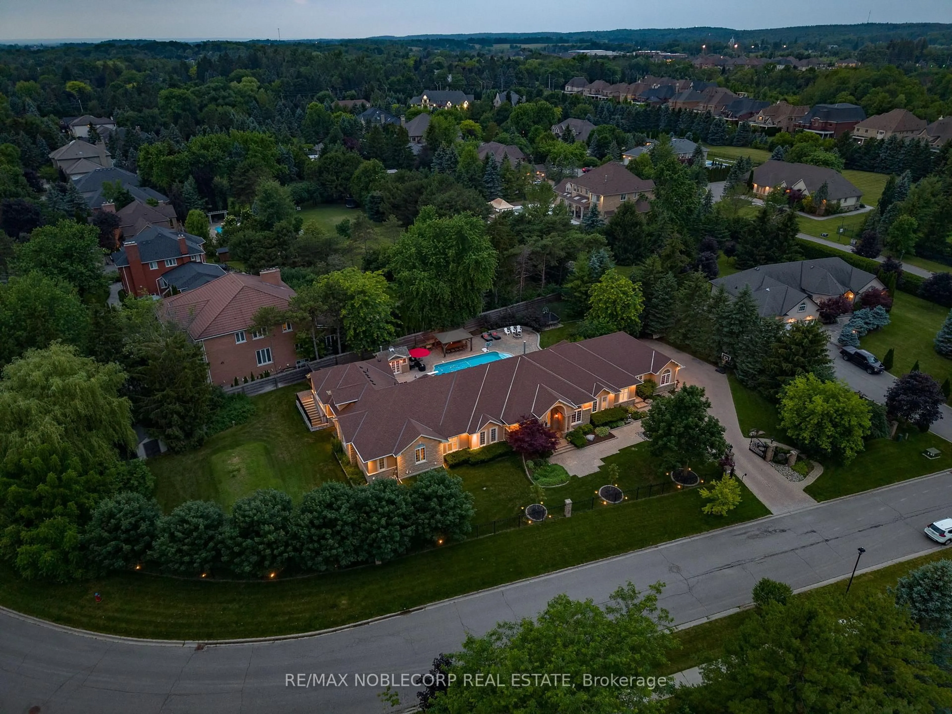 A pic from outside/outdoor area/front of a property/back of a property/a pic from drone, mountain view for 80 Carmichael Cres, King Ontario L7B 1B5