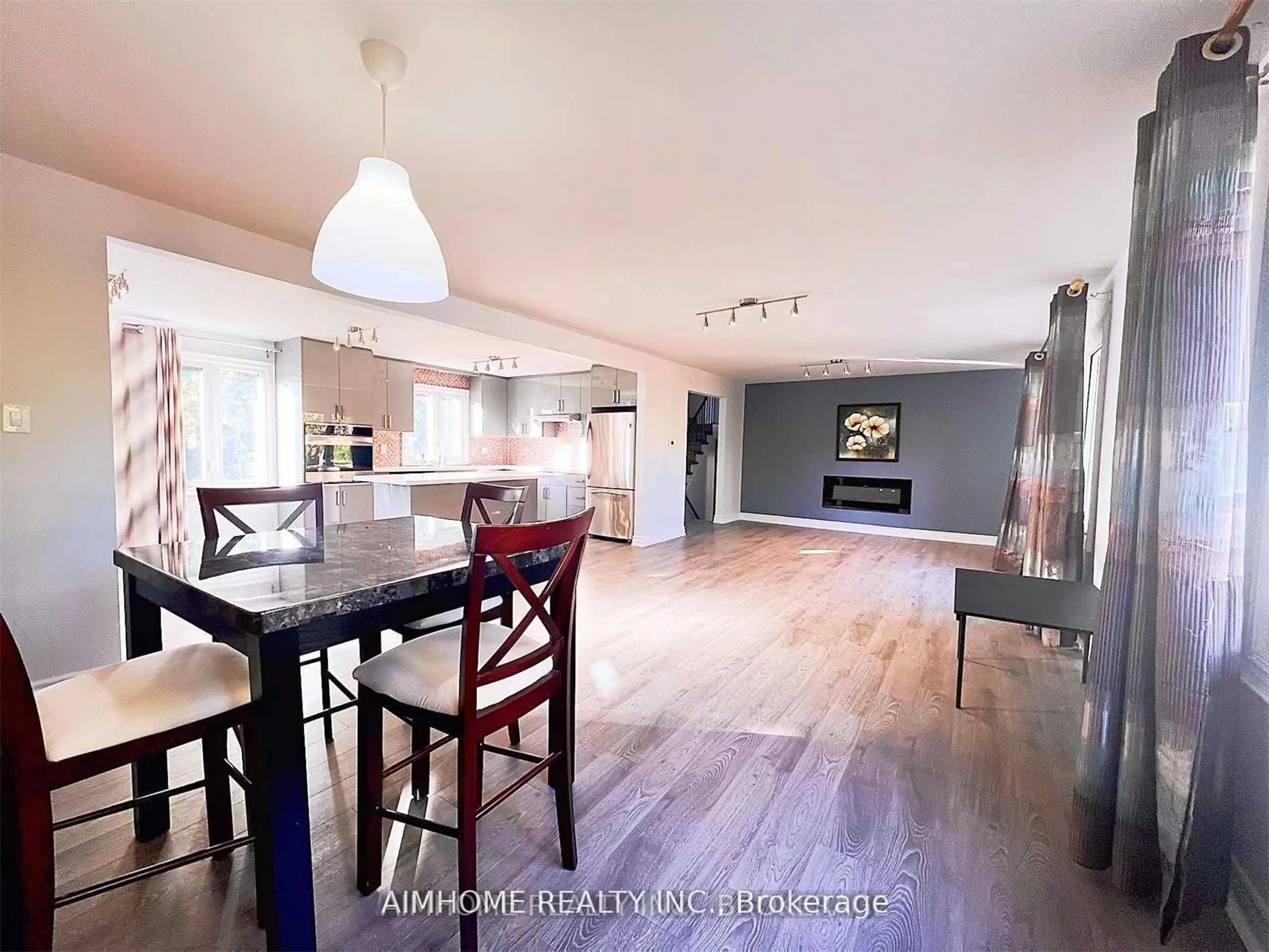 Open concept kitchen, wood/laminate floor for 344 Steeles Ave, Markham Ontario L3T 1A8