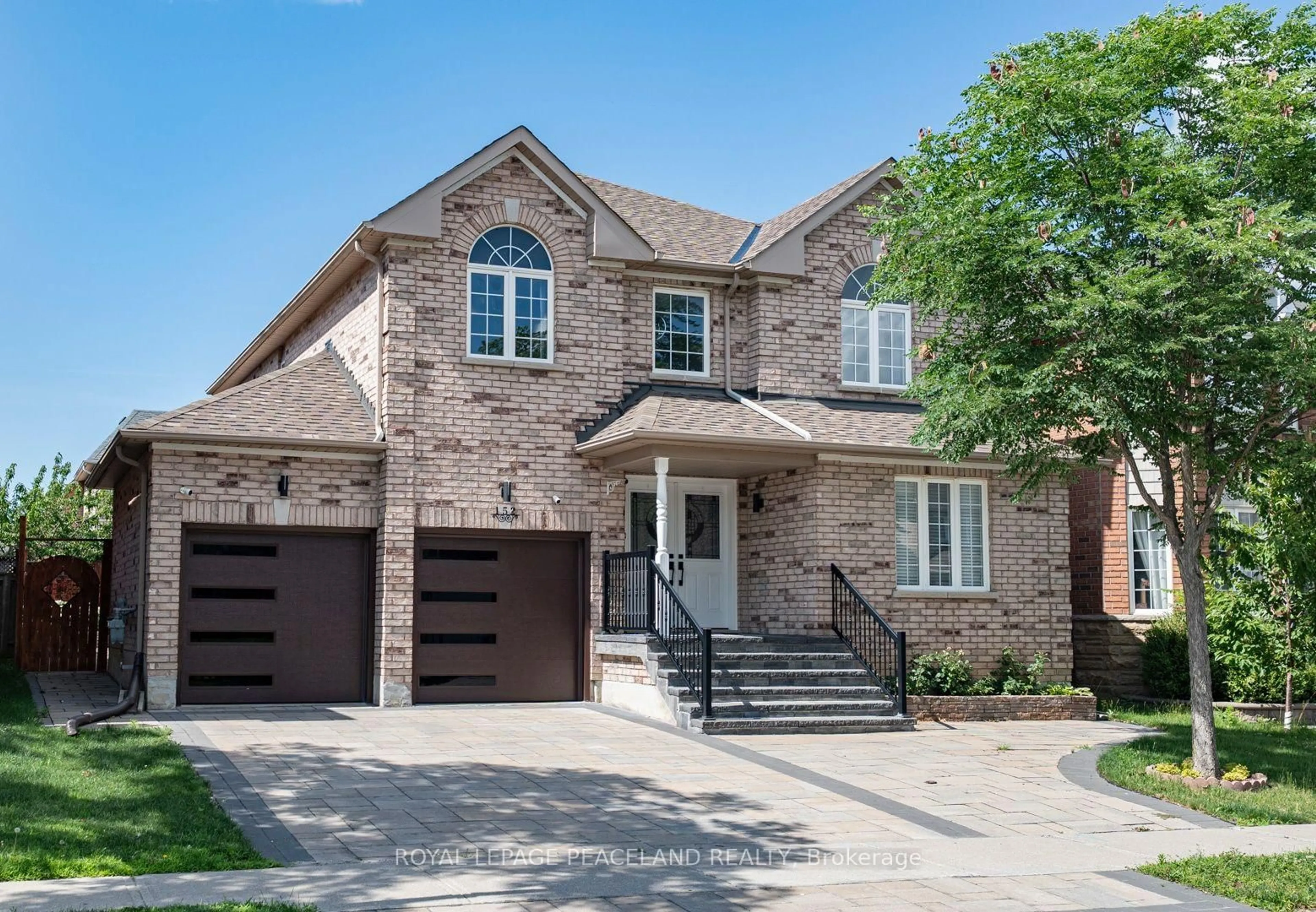 Home with brick exterior material, street for 152 Flagstone Way, Newmarket Ontario L3X 2Z7