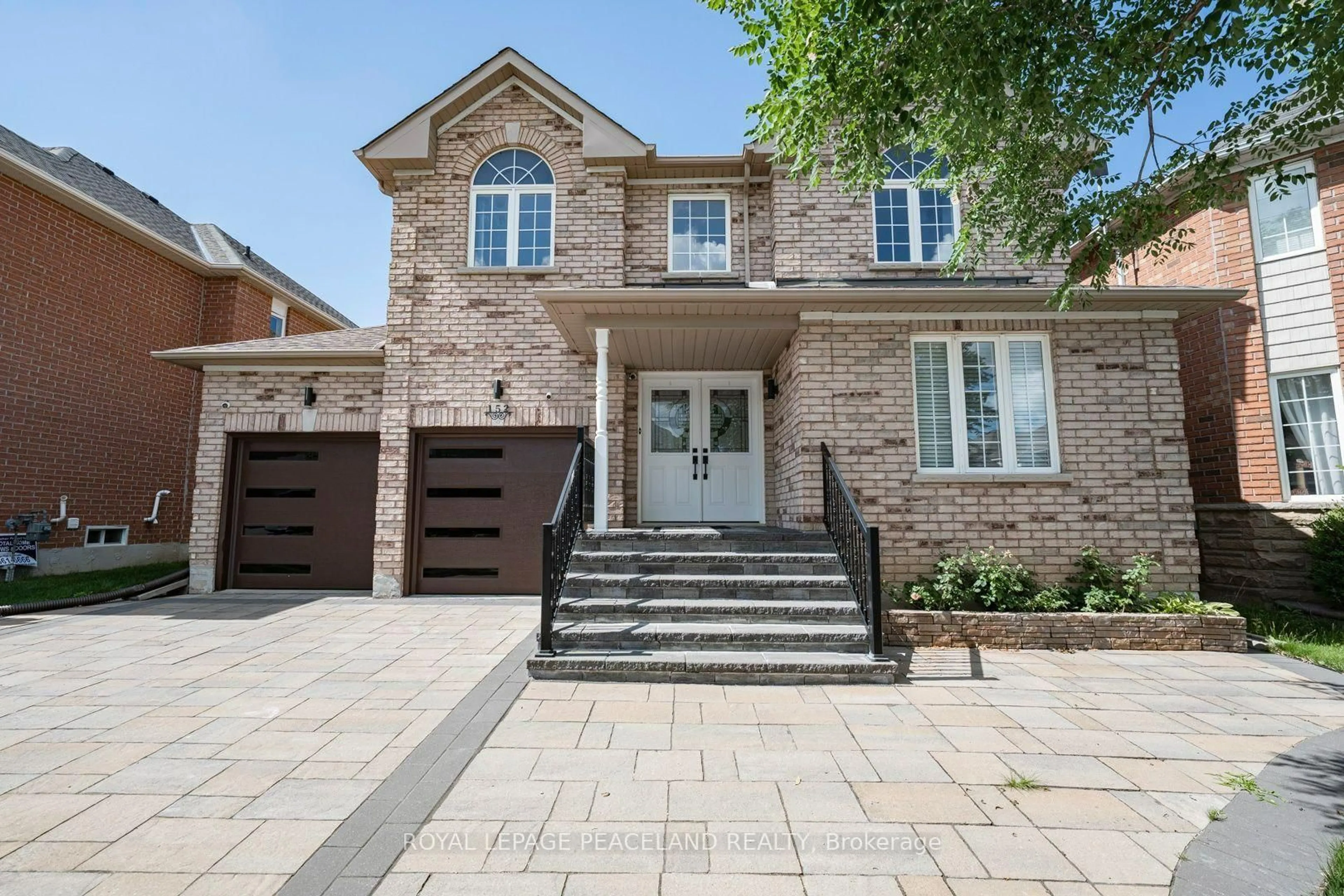 Home with brick exterior material, street for 152 Flagstone Way, Newmarket Ontario L3X 2Z7