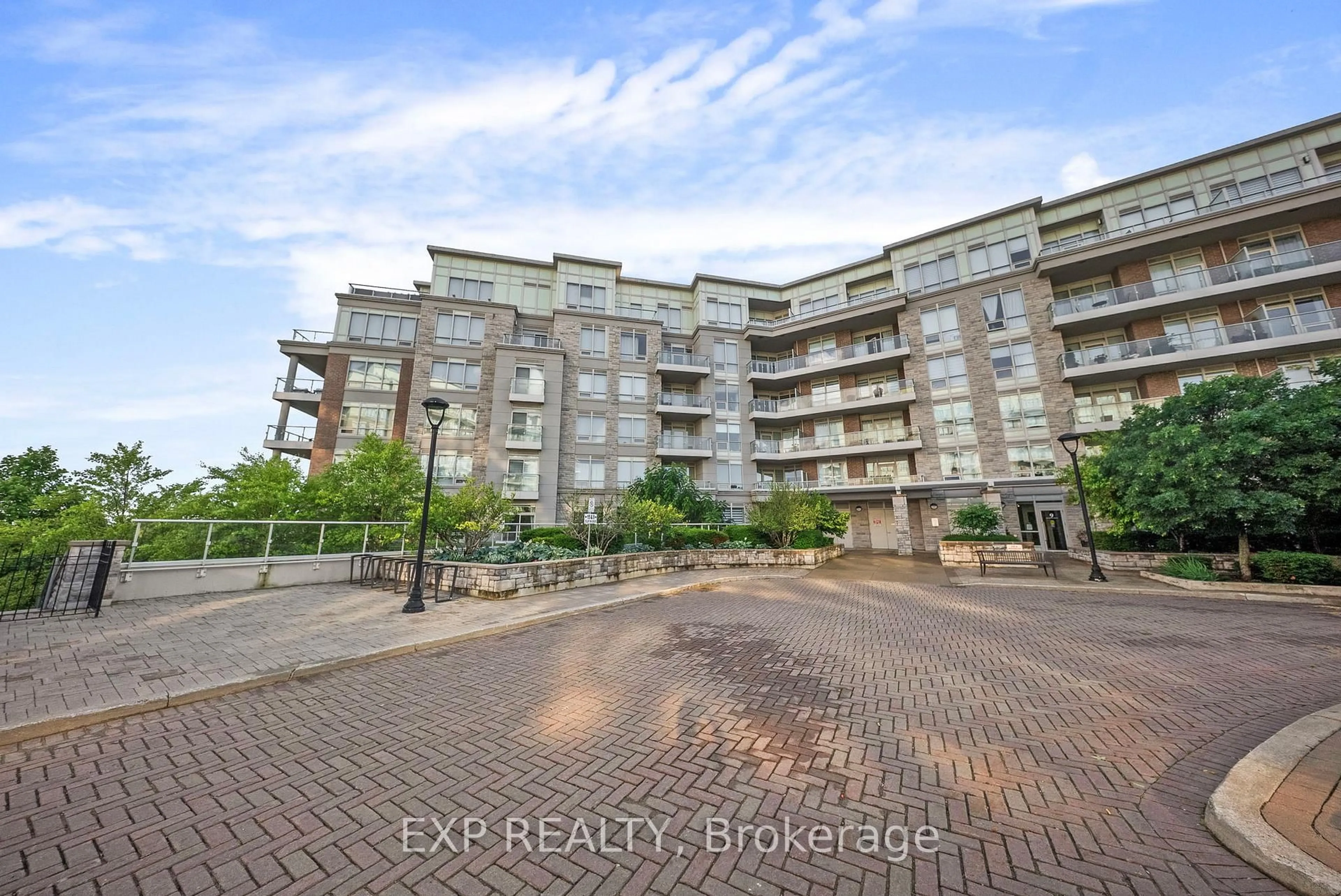 A pic from outside/outdoor area/front of a property/back of a property/a pic from drone, unknown for 9 Stollery Pond Cres #203, Markham Ontario L6C 0Y1
