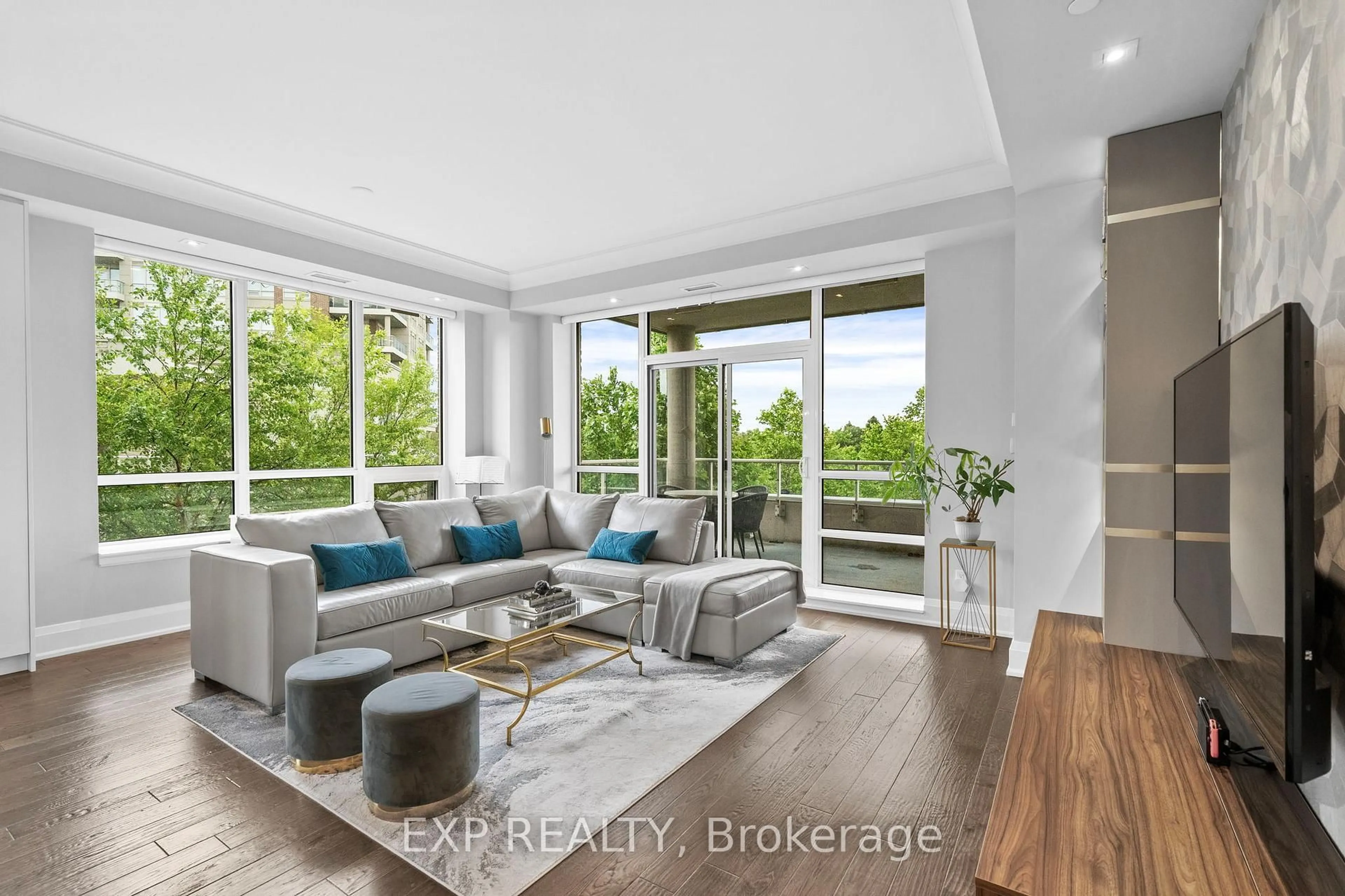 Living room with furniture, unknown for 9 Stollery Pond Cres #203, Markham Ontario L6C 0Y1