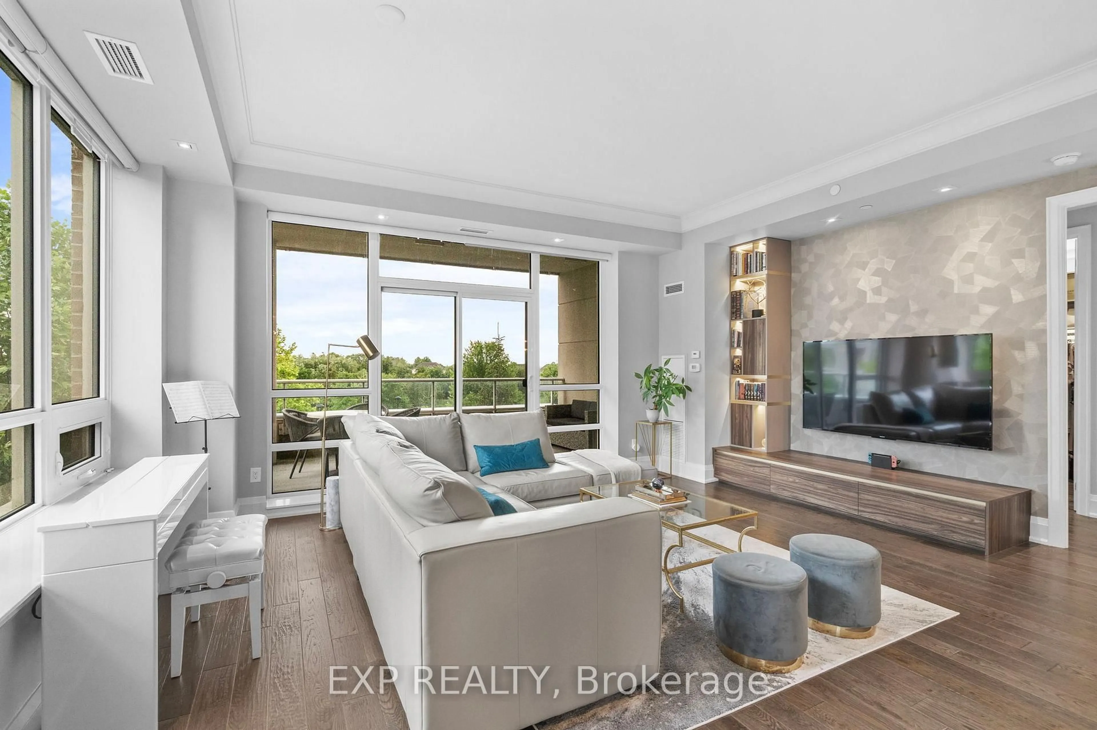 Living room with furniture, unknown for 9 Stollery Pond Cres #203, Markham Ontario L6C 0Y1
