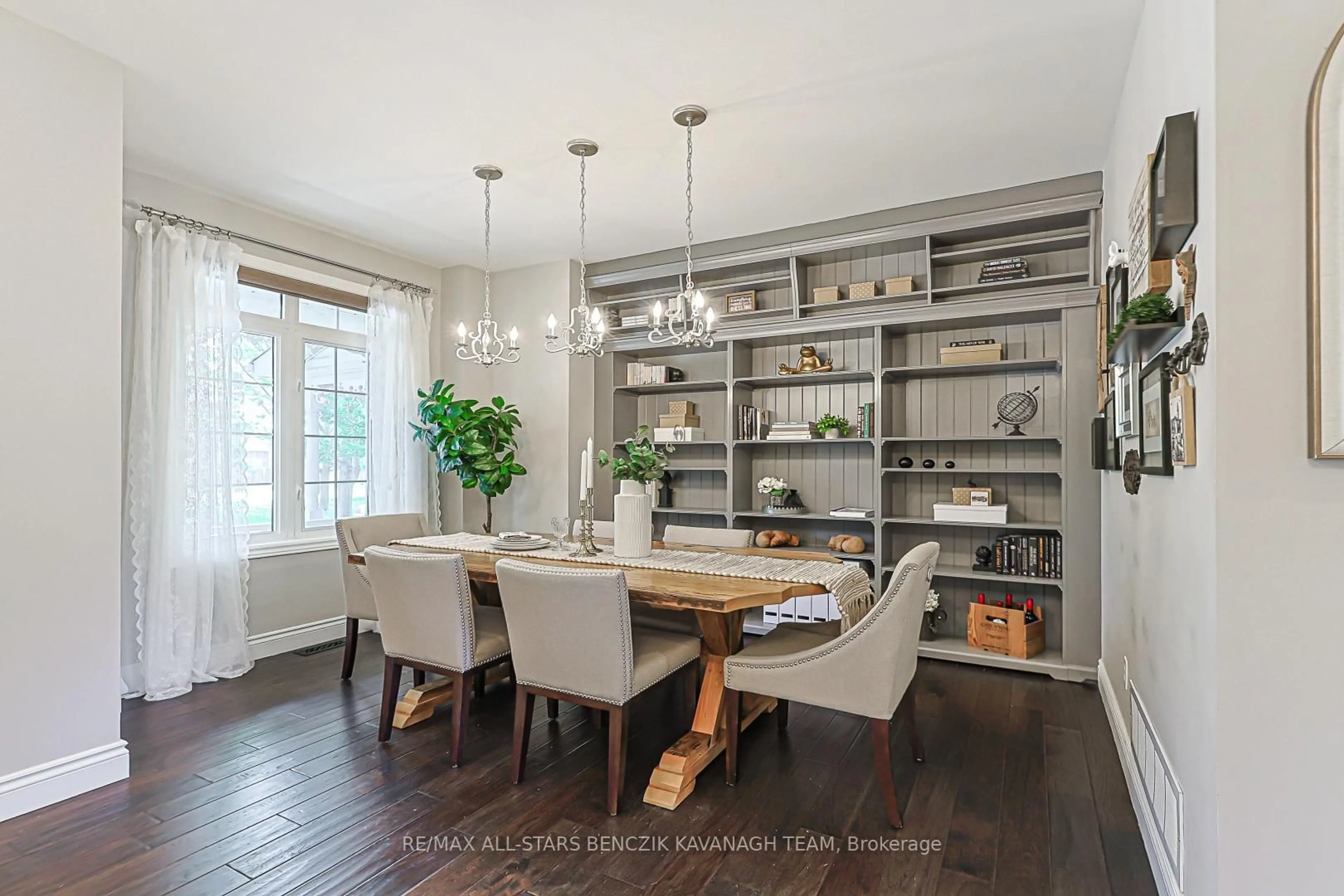 Dining room, wood/laminate floor for 31 Queen's Plate Dr, Markham Ontario L6C 2A9