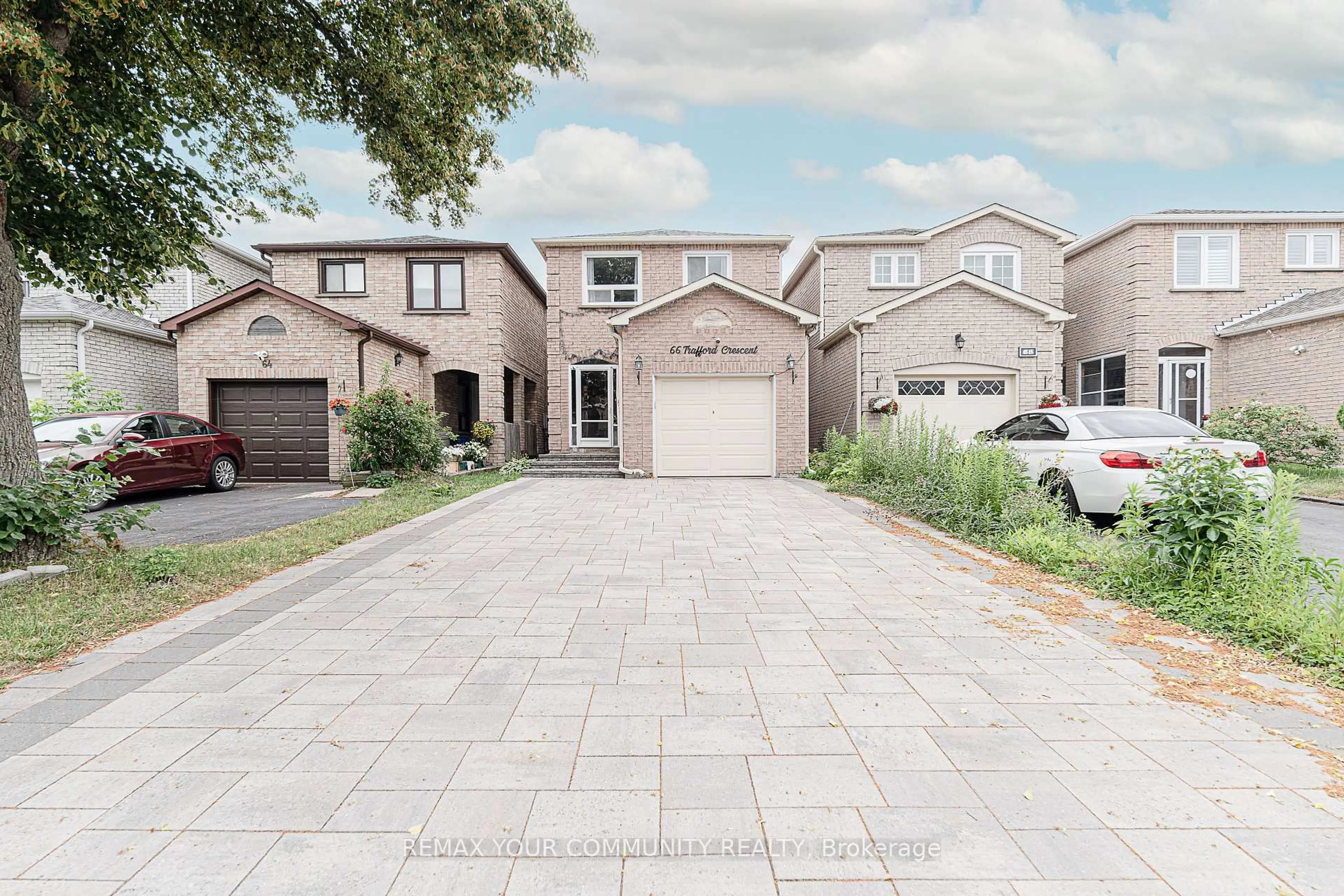 Home with brick exterior material, street for 66 Trafford Cres, Markham Ontario L3R 7J2