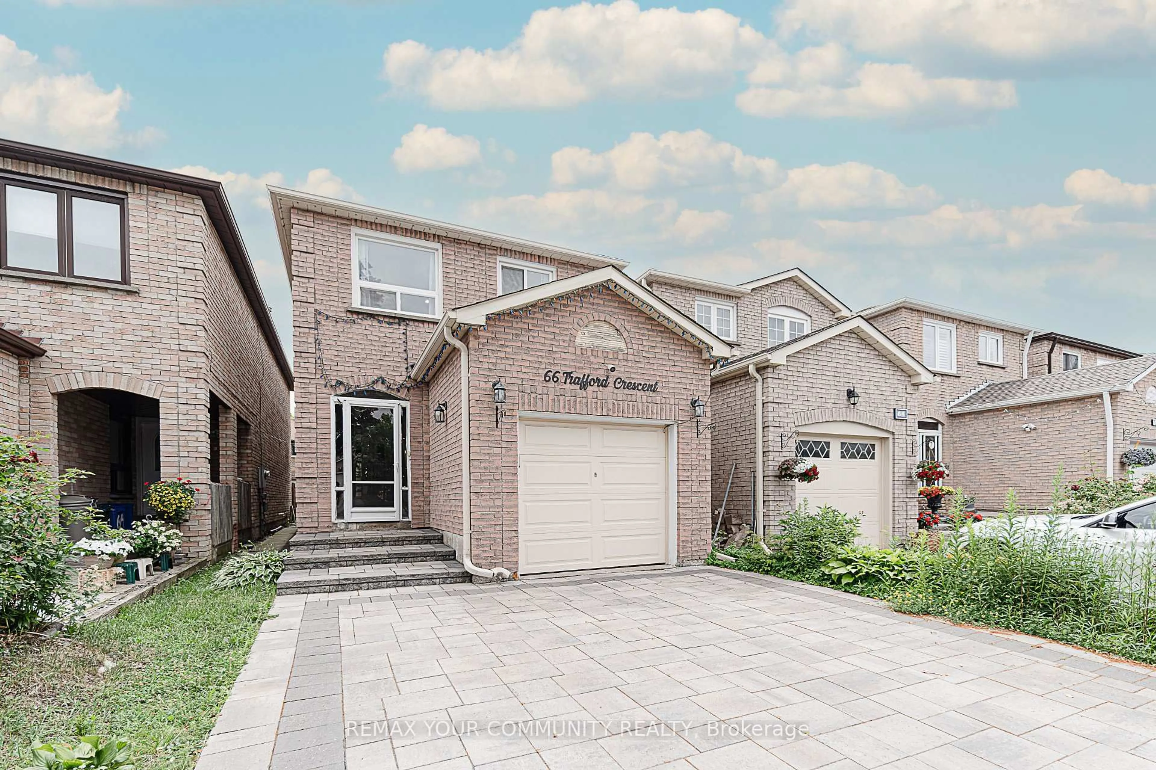 Home with brick exterior material, street for 66 Trafford Cres, Markham Ontario L3R 7J2