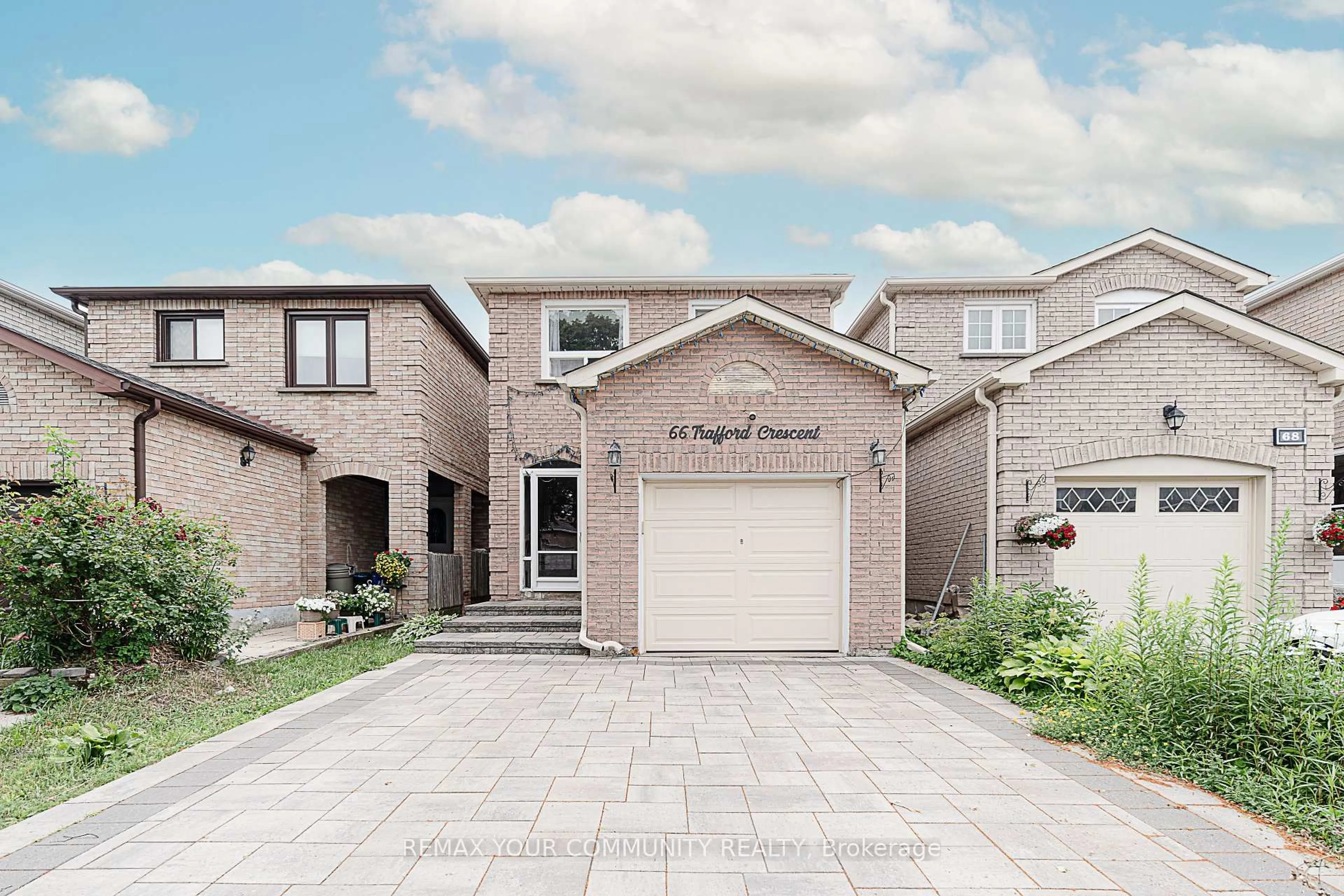 Home with brick exterior material, street for 66 Trafford Cres, Markham Ontario L3R 7J2