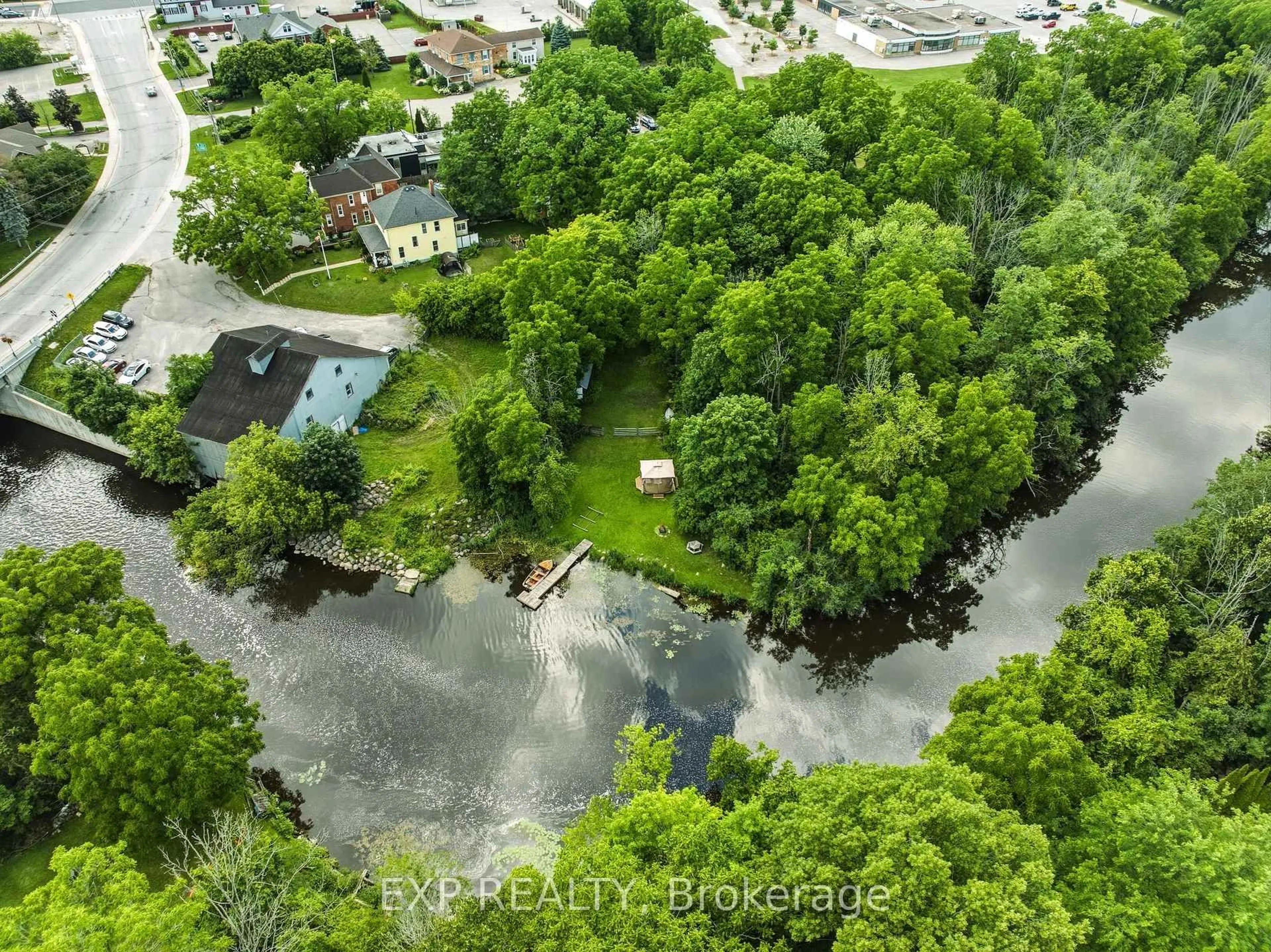 A pic from outside/outdoor area/front of a property/back of a property/a pic from drone, water/lake/river/ocean view for 145 High St, Georgina Ontario L0E 1R0