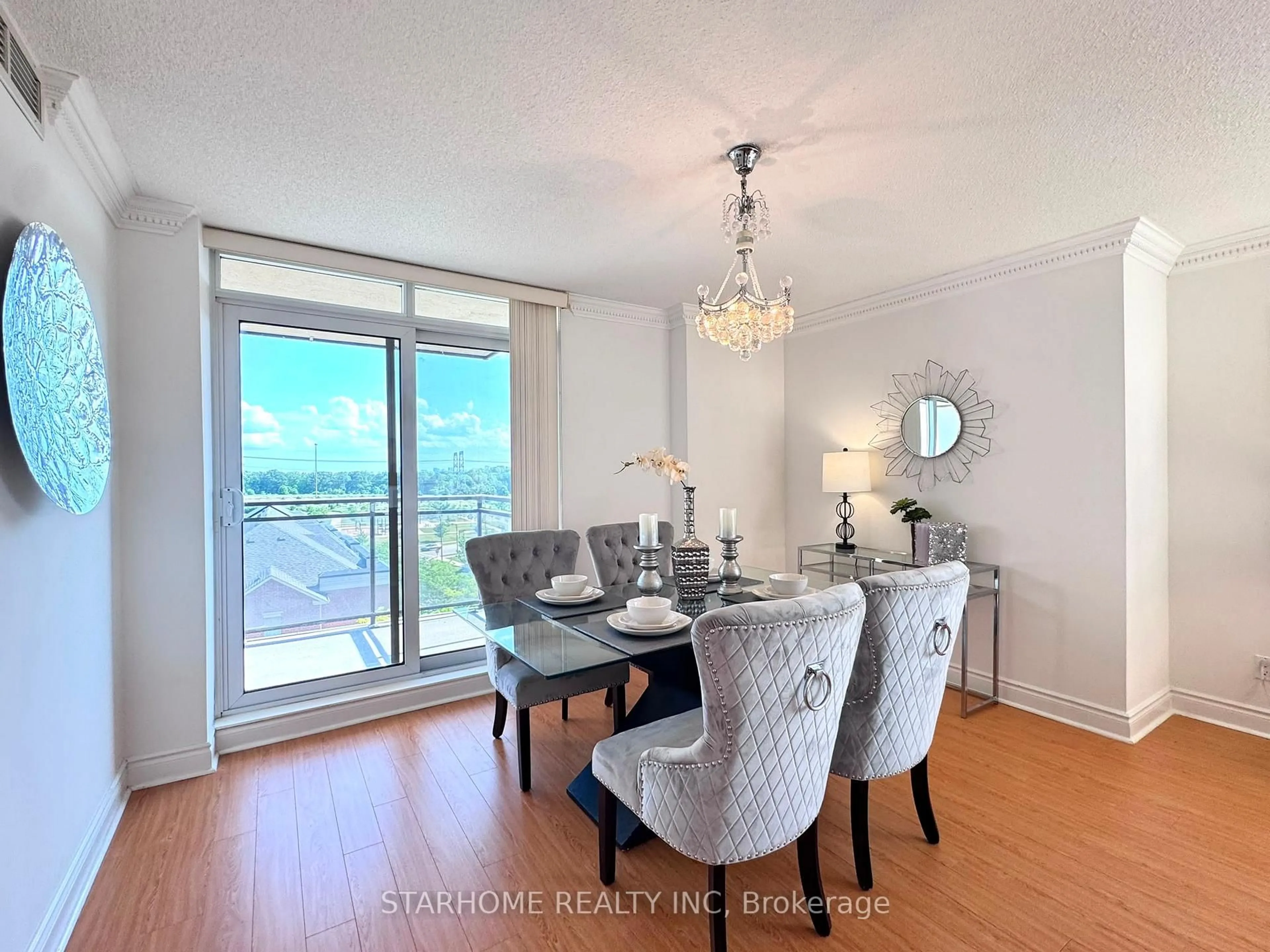 Dining room, wood/laminate floor for 51 Saddlecreek Dr #605, Markham Ontario L3T 7Z1