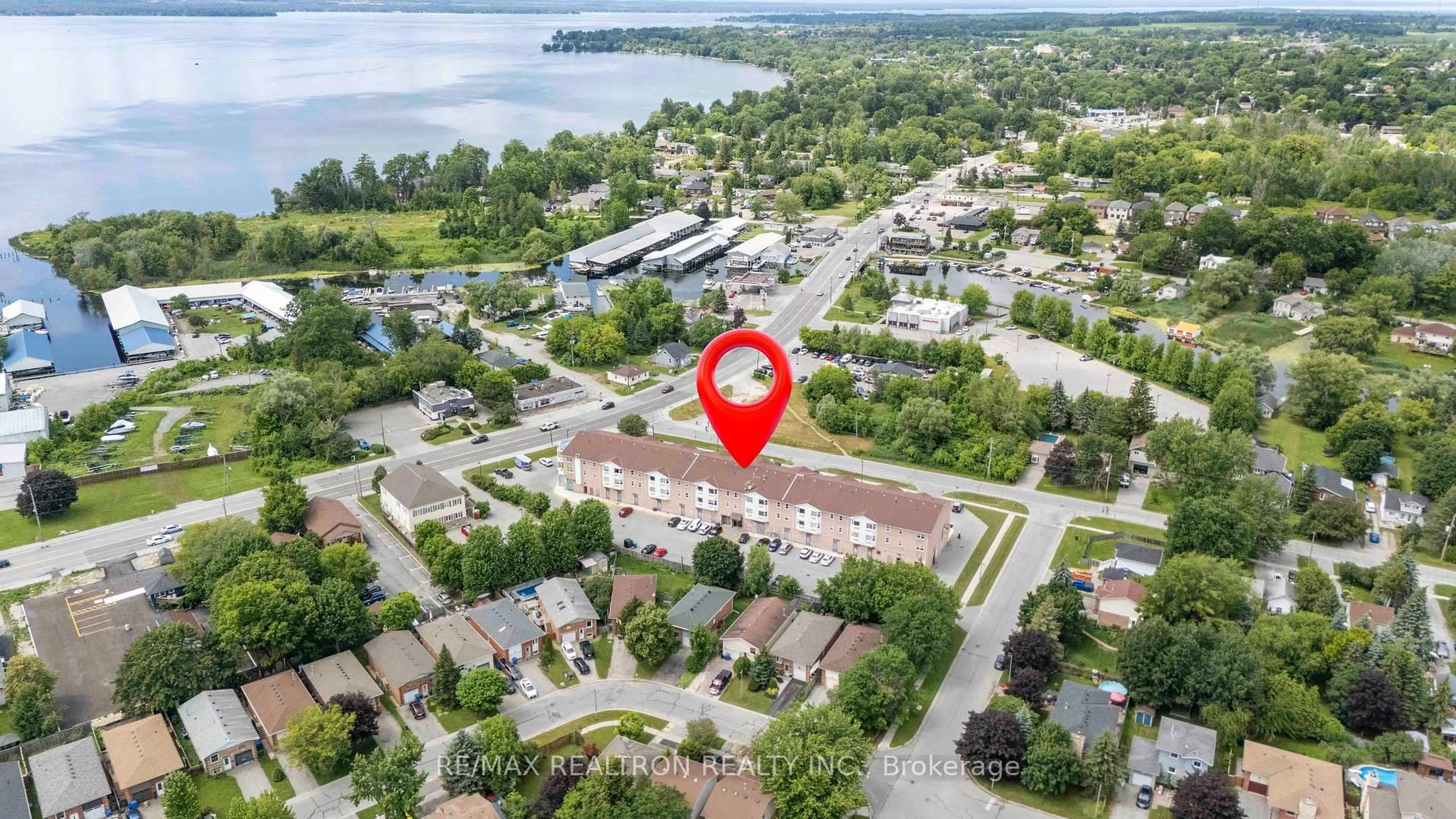 A pic from outside/outdoor area/front of a property/back of a property/a pic from drone, water/lake/river/ocean view for 155 Riverglen Dr #315, Georgina Ontario L4P 3M3