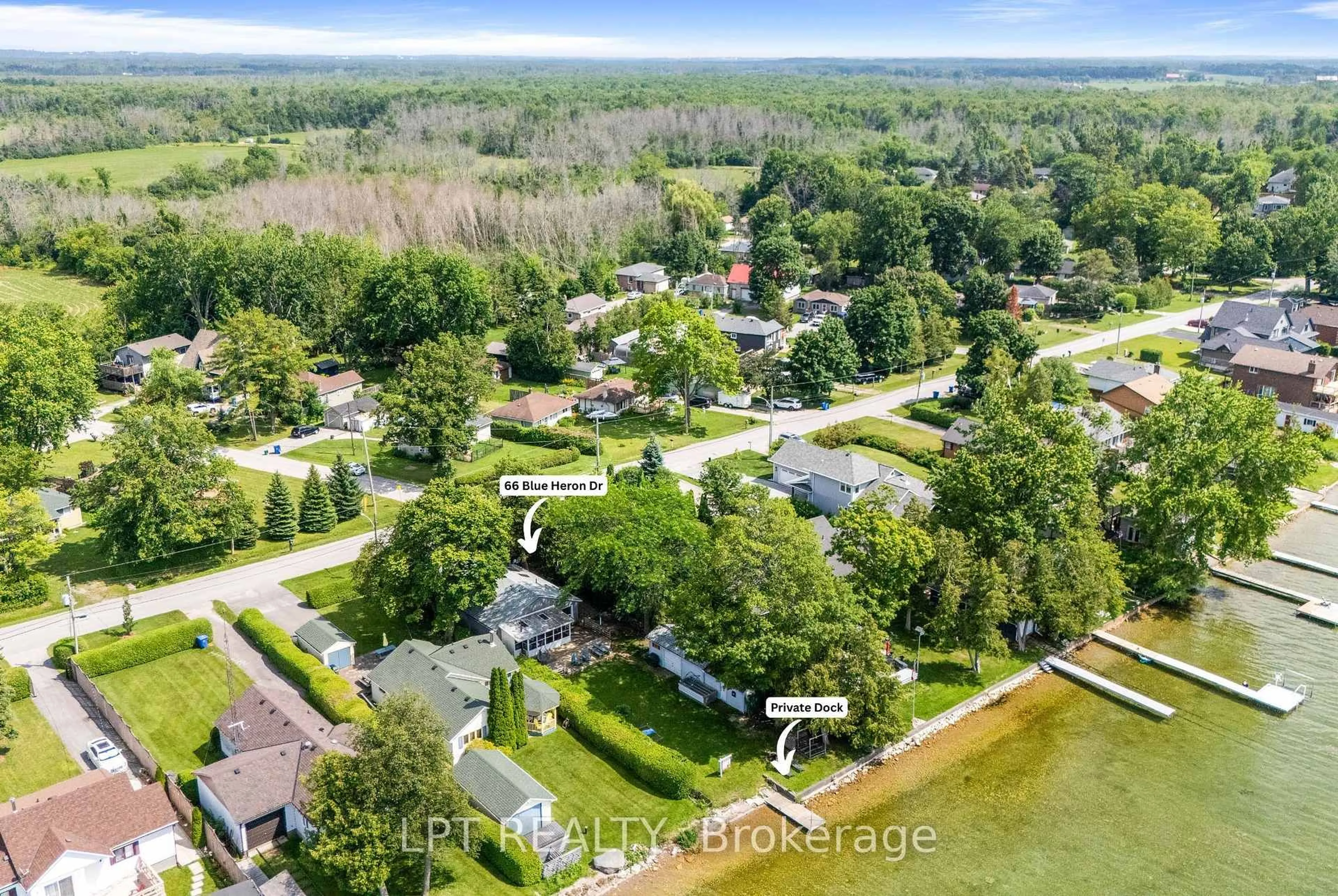 A pic from outside/outdoor area/front of a property/back of a property/a pic from drone, water/lake/river/ocean view for 66 Blue Heron Dr, Georgina Ontario L0E 1N0