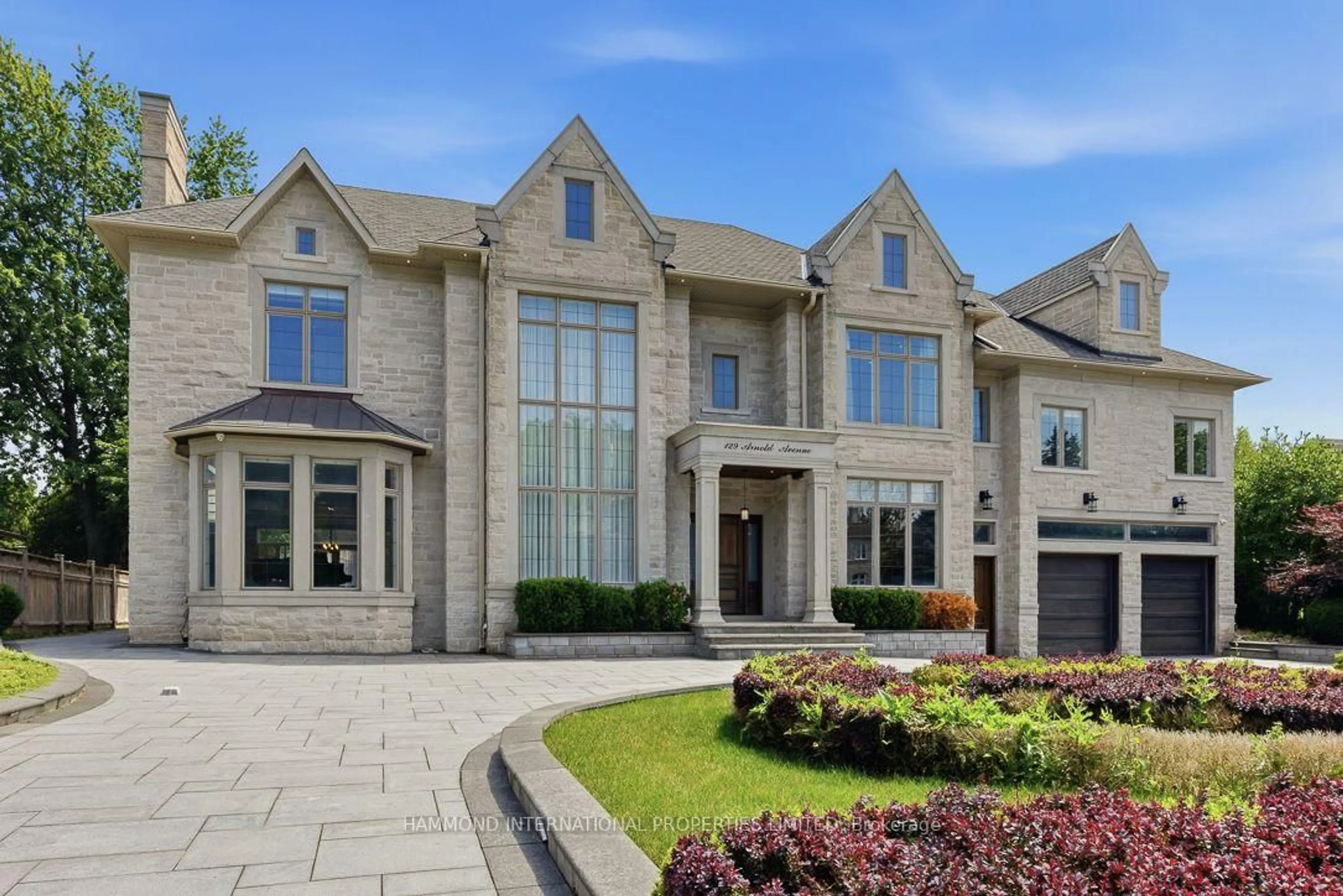 Home with brick exterior material, street for 129 Arnold Ave, Vaughan Ontario L4J 1B8