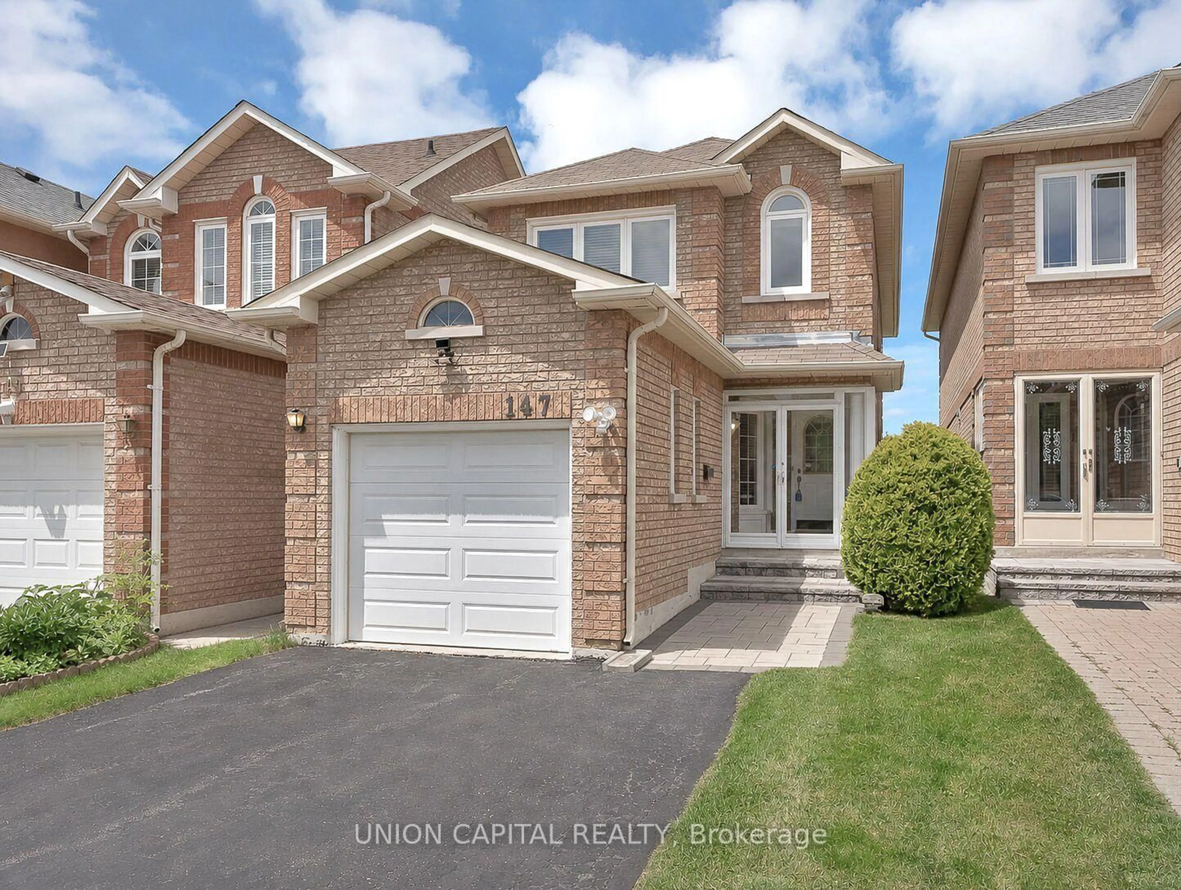 Home with brick exterior material, street for 147 Milliken Meadows Dr, Markham Ontario L3R 0V7