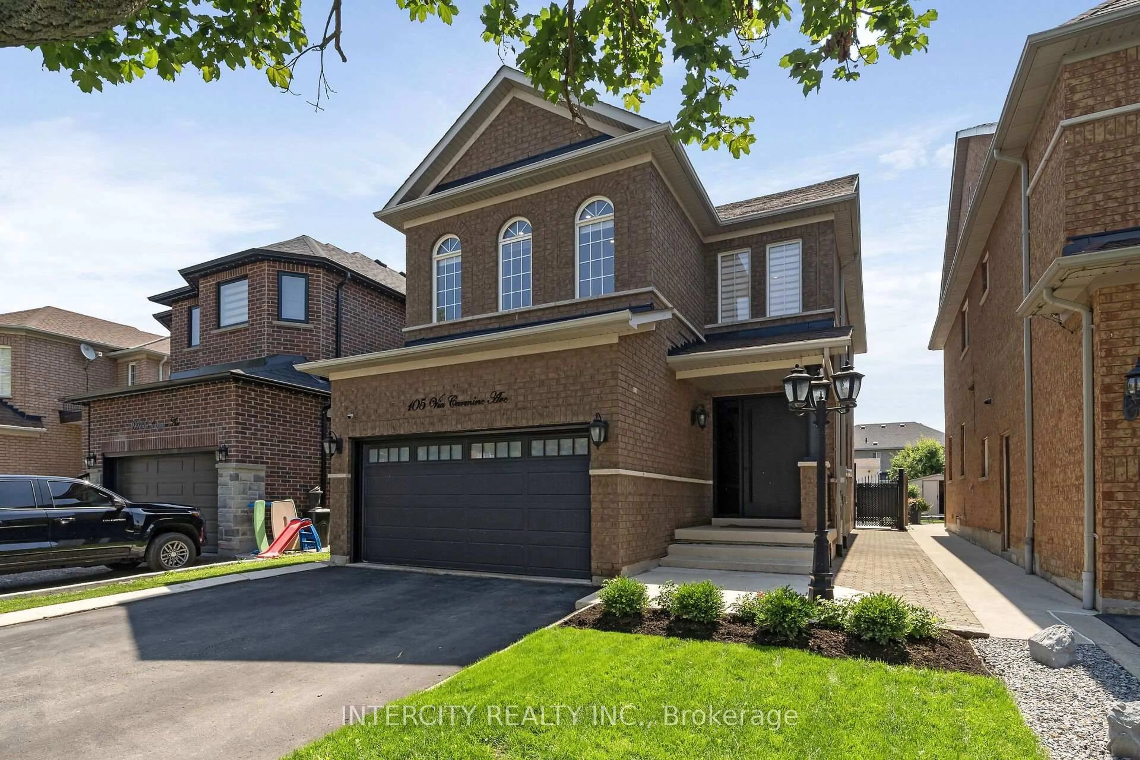 Home with brick exterior material, street for 105 Via Carmine Ave, Vaughan Ontario L4H 1Z9