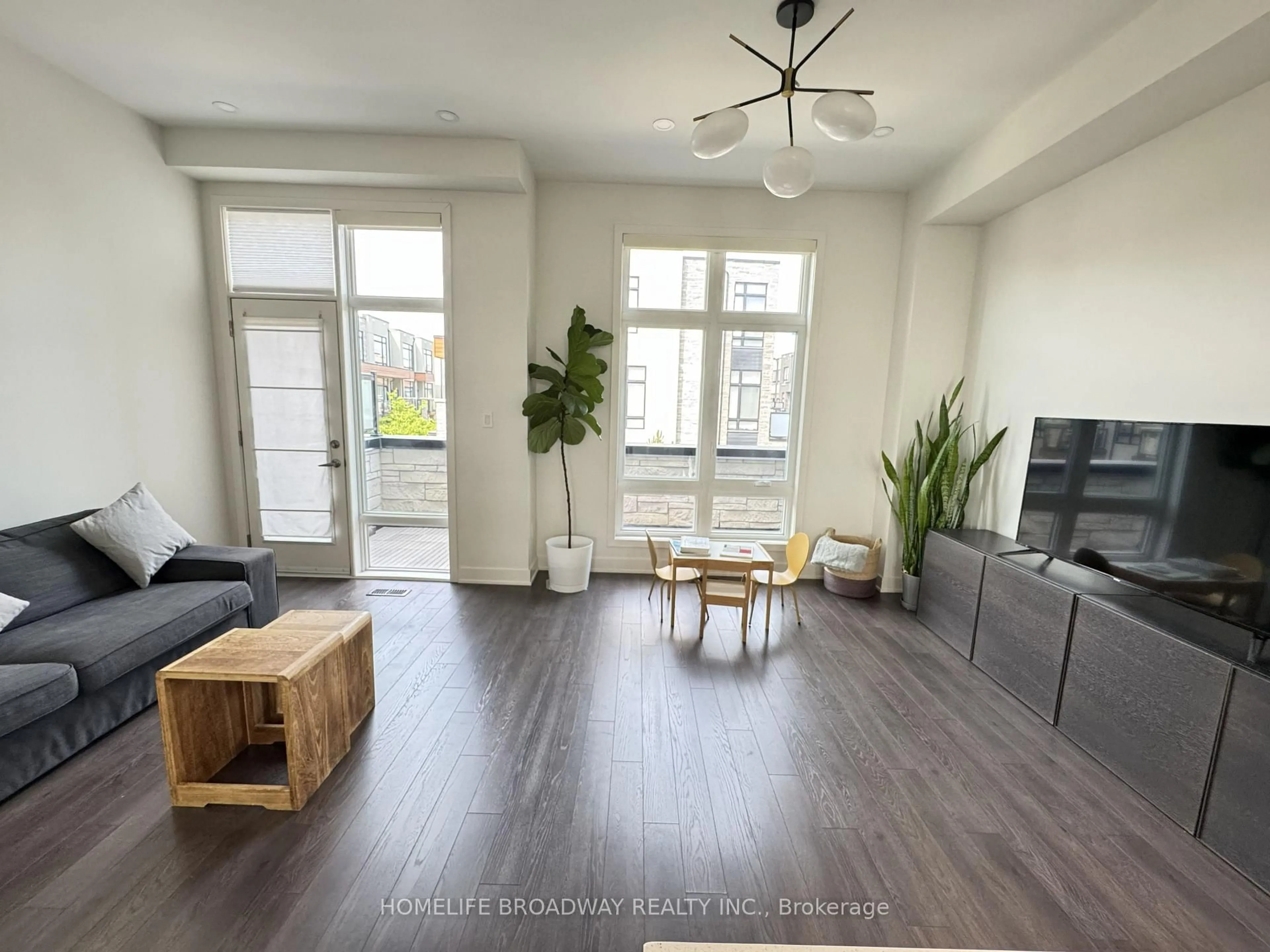 Living room with furniture, wood/laminate floor for 99 Carpaccio Ave, Vaughan Ontario L4H 4R5