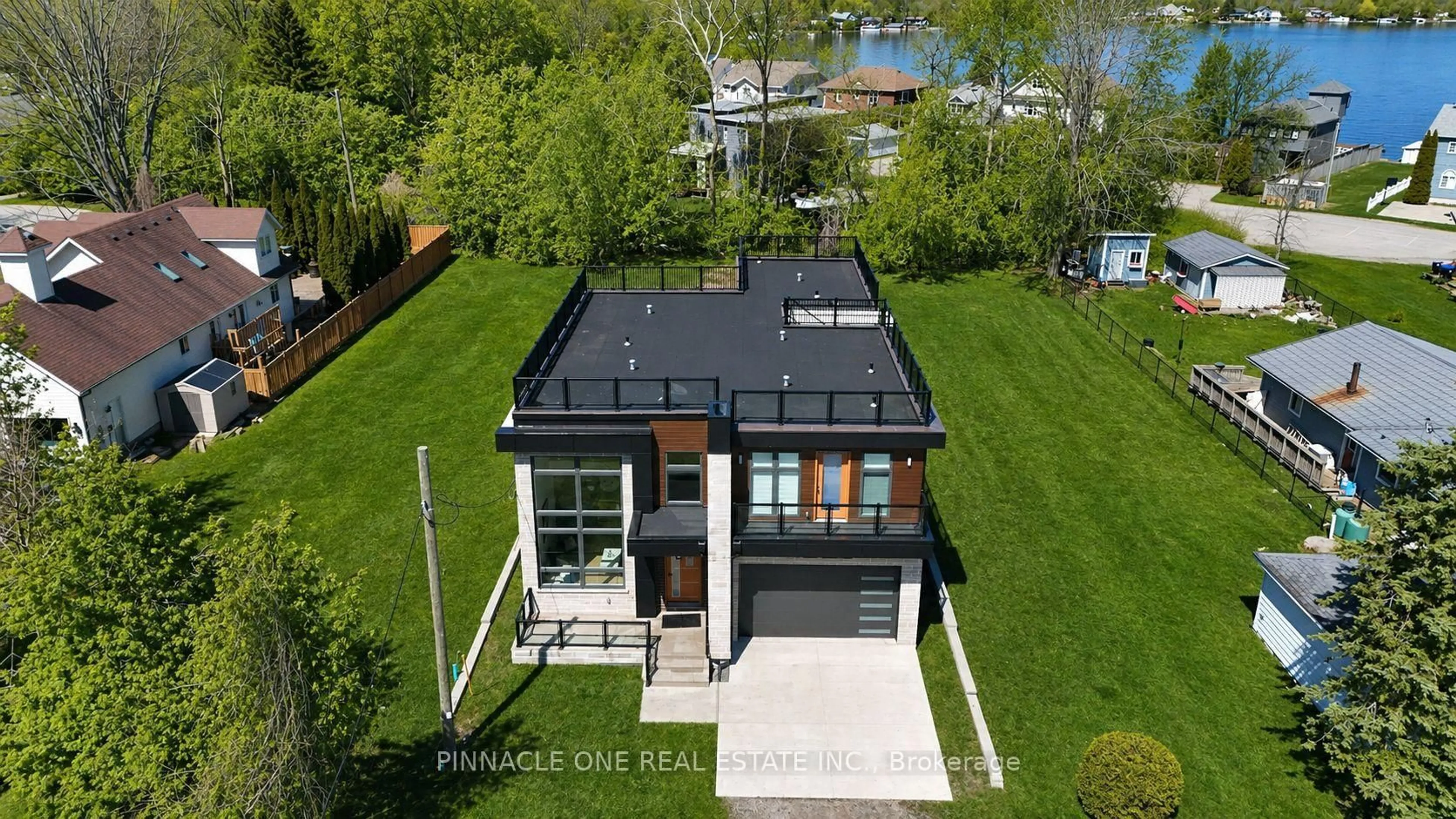 A pic from outside/outdoor area/front of a property/back of a property/a pic from drone, water/lake/river/ocean view for 992 Little Cedar Ave, Innisfil Ontario L0L 1W0
