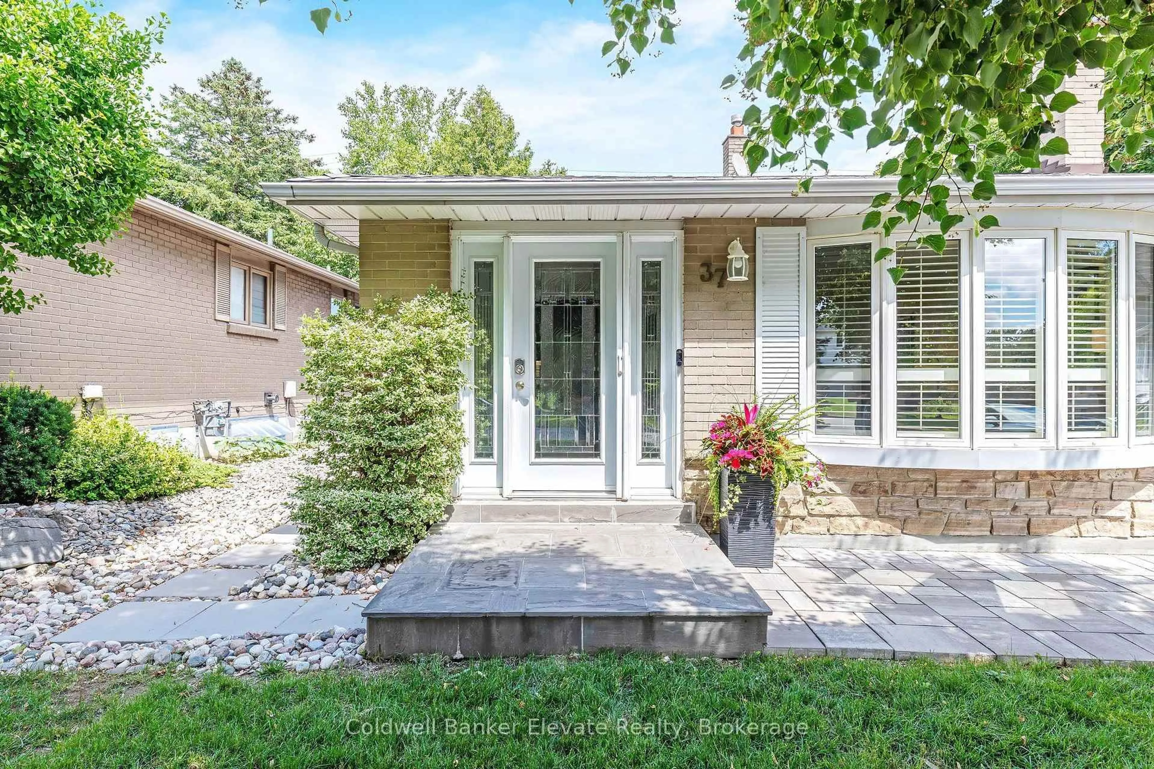 Home with brick exterior material, street for 37 Fleance Dr, Markham Ontario L3T 3J8