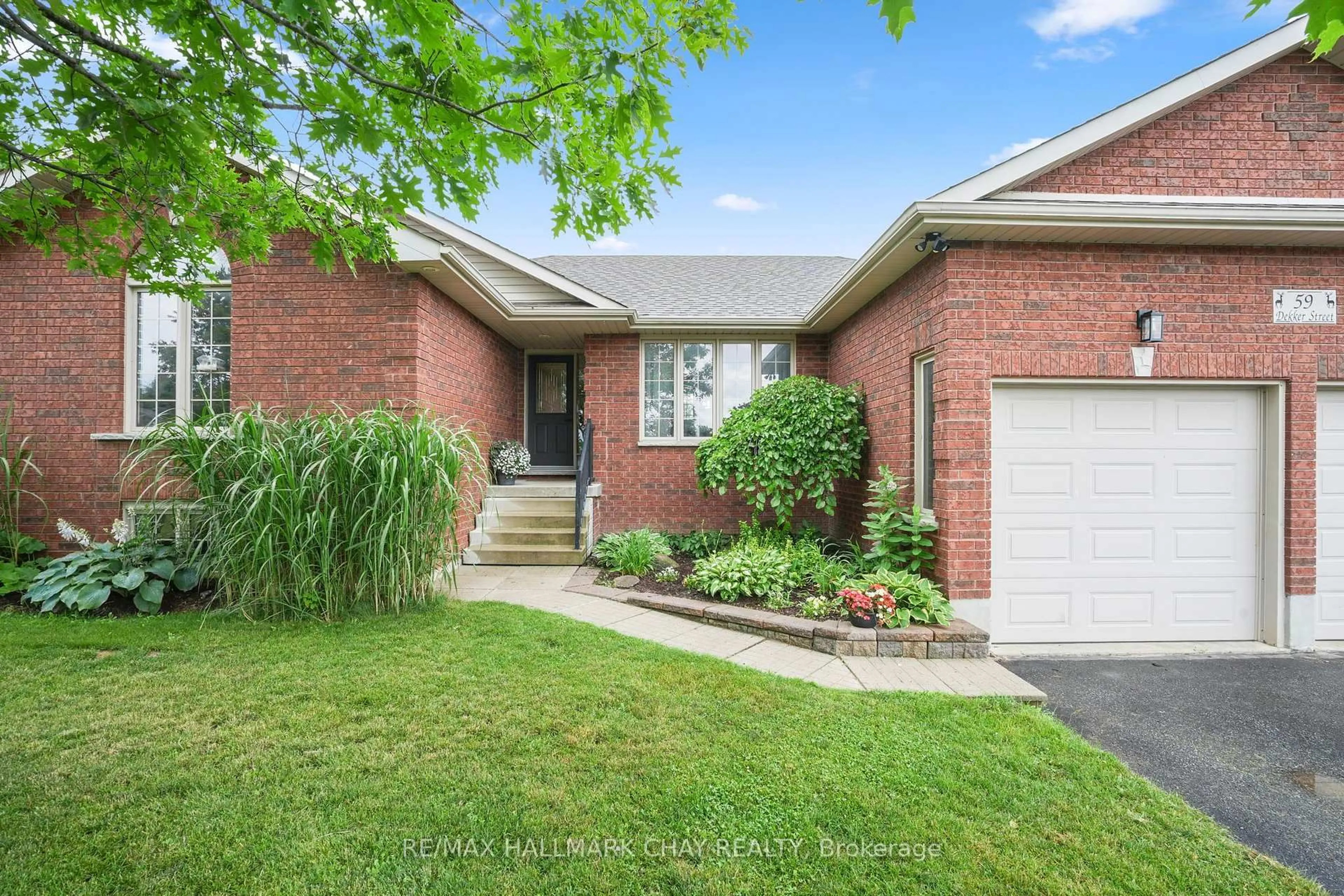 Home with brick exterior material, street for 59 Dekker St, Adjala-Tosorontio Ontario L0M 1J0