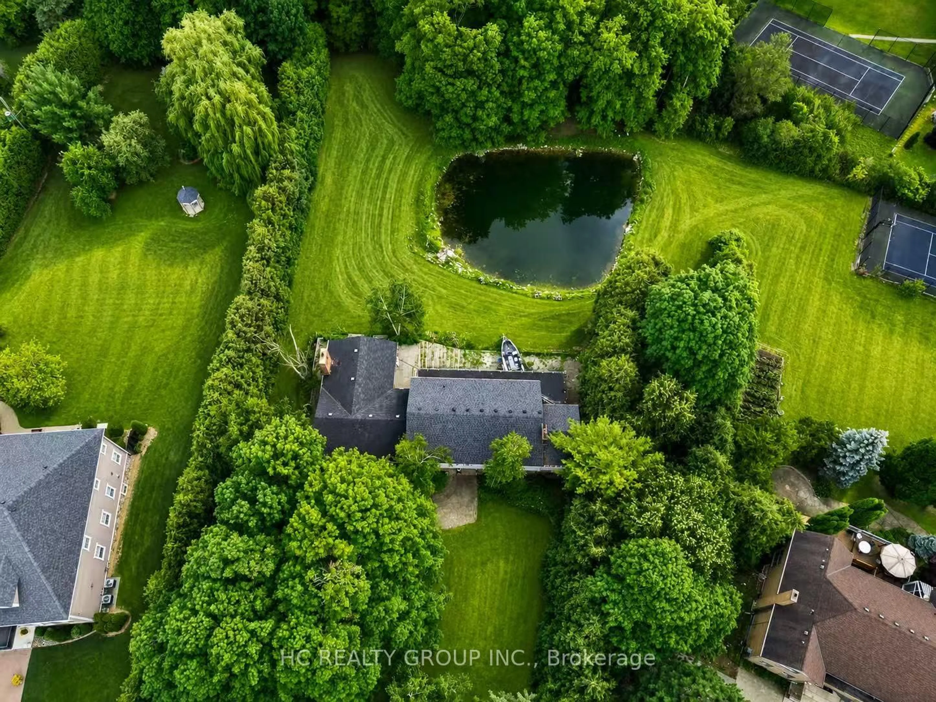 A pic from outside/outdoor area/front of a property/back of a property/a pic from drone, forest/trees view for 16 Bernadotte Dr, Markham Ontario L6C 1E1