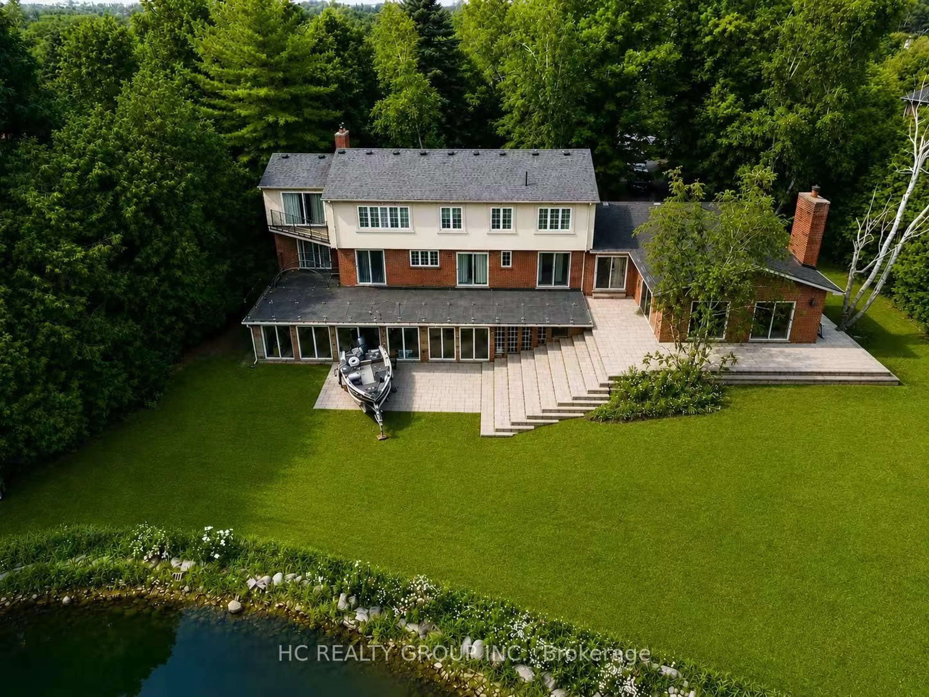 A pic from outside/outdoor area/front of a property/back of a property/a pic from drone, water/lake/river/ocean view for 16 Bernadotte Dr, Markham Ontario L6C 1E1