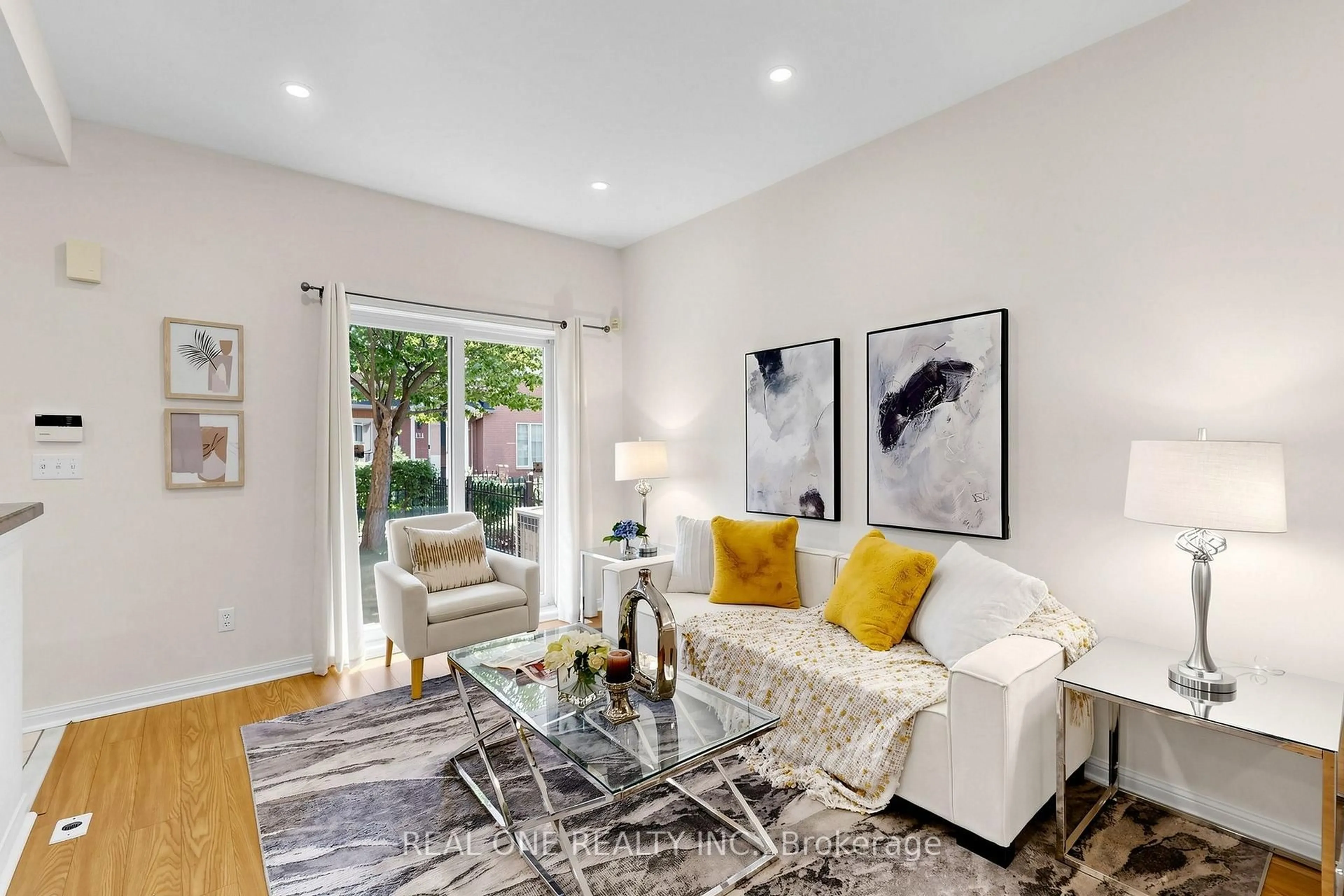 Living room with furniture, unknown for 12 St Moritz Way #6, Markham Ontario L3R 4E8